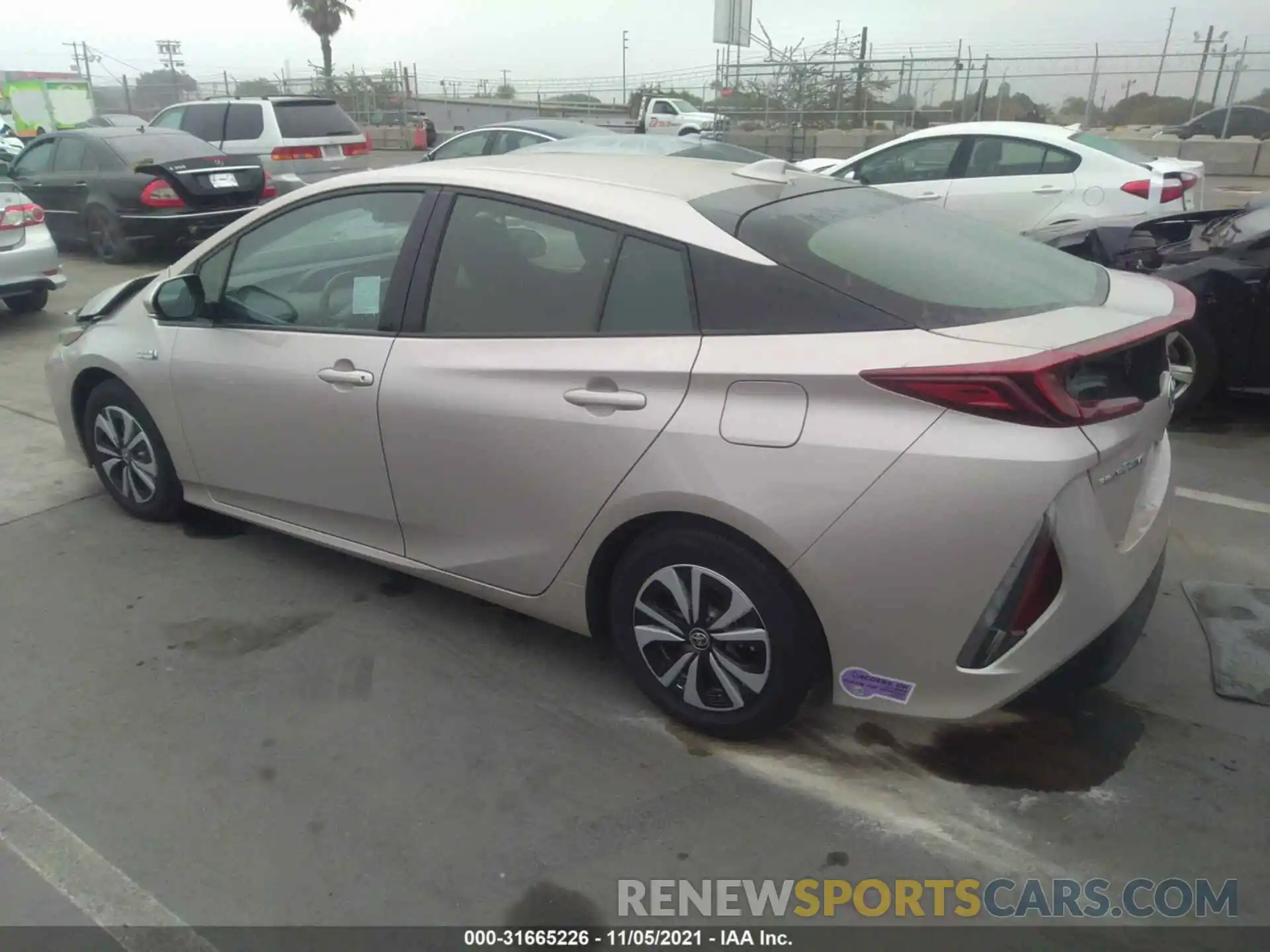 3 Photograph of a damaged car JTDKARFP4K3115135 TOYOTA PRIUS PRIME 2019