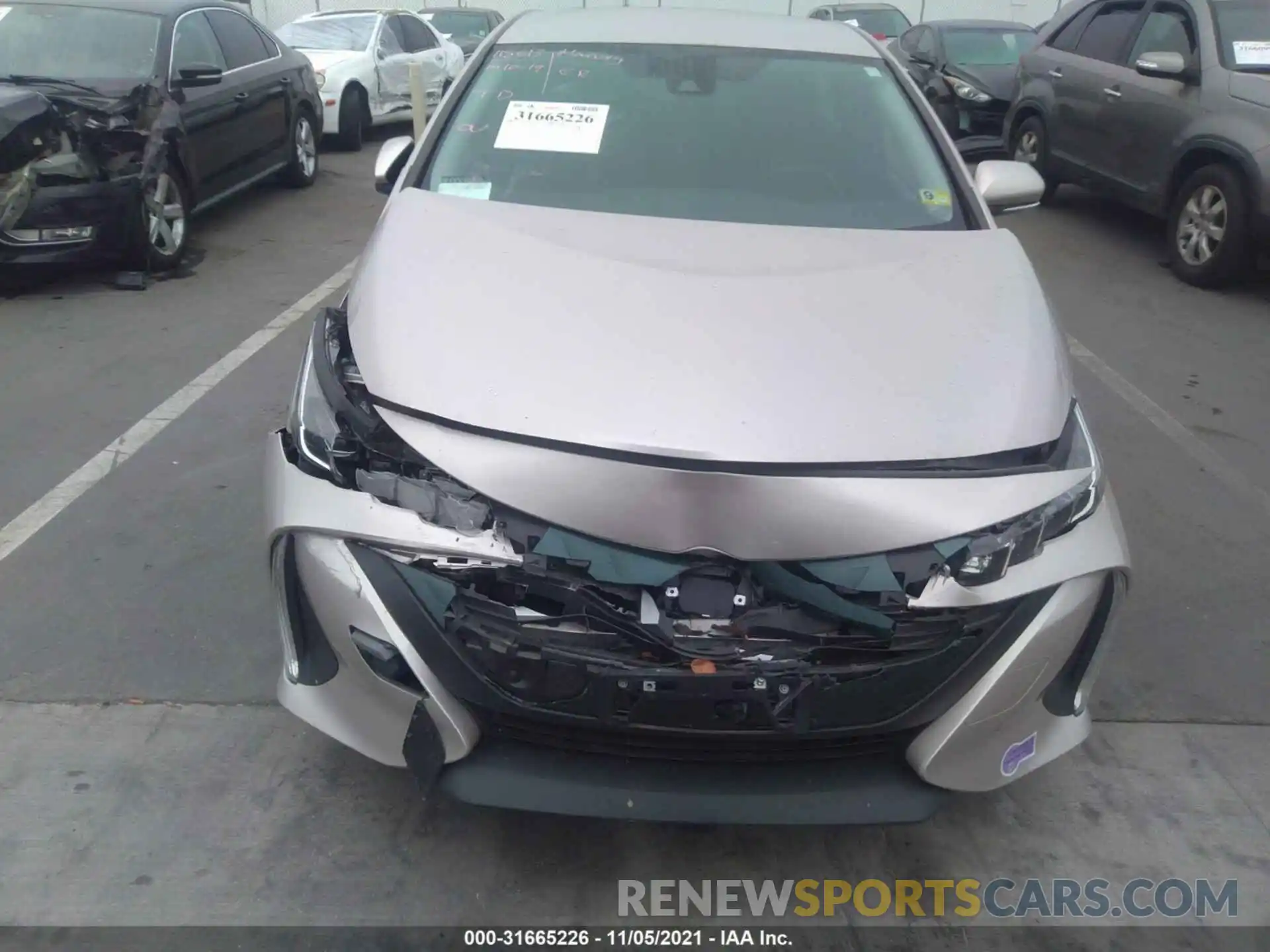 6 Photograph of a damaged car JTDKARFP4K3115135 TOYOTA PRIUS PRIME 2019