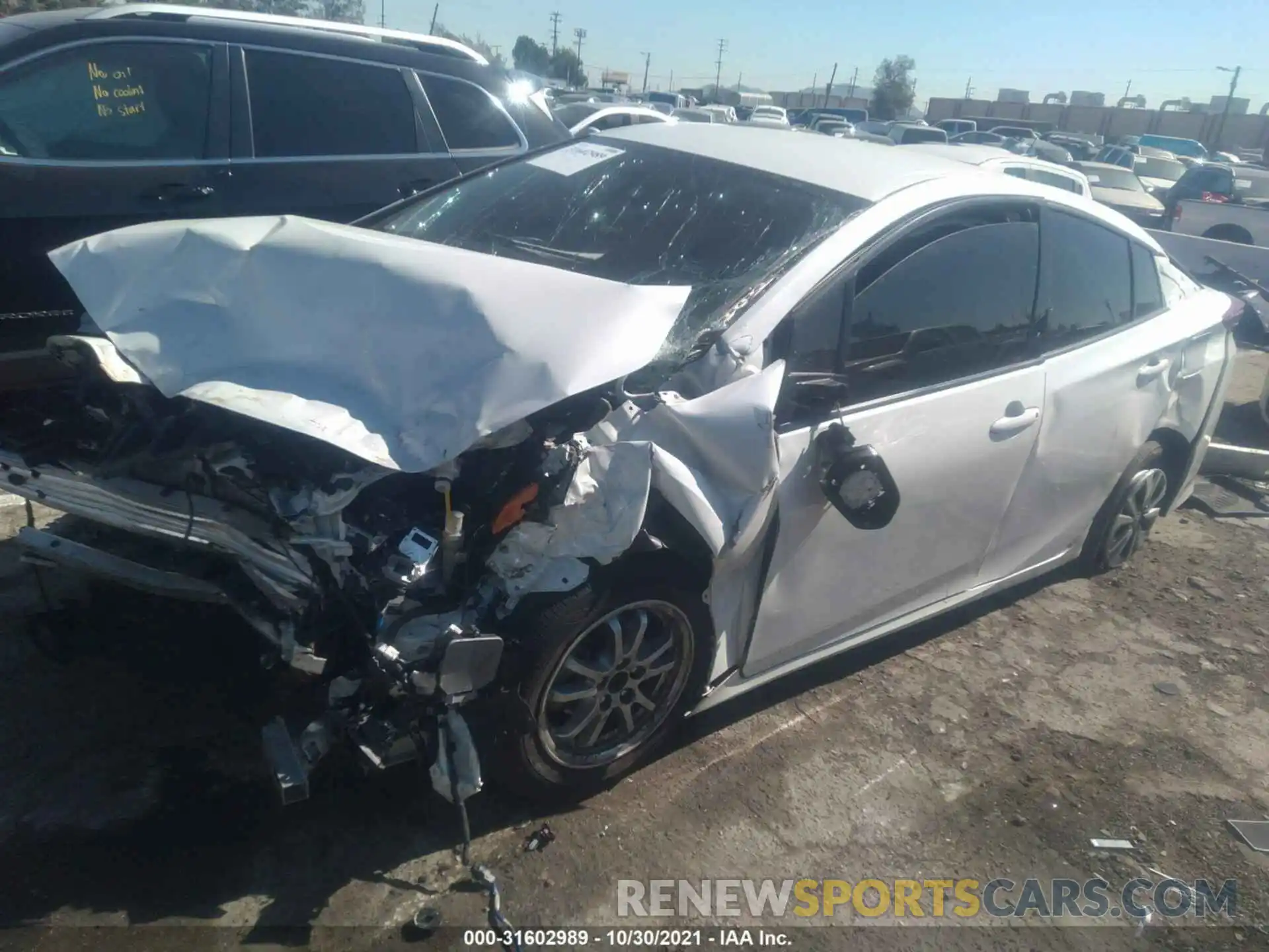 2 Photograph of a damaged car JTDKARFP4K3116396 TOYOTA PRIUS PRIME 2019