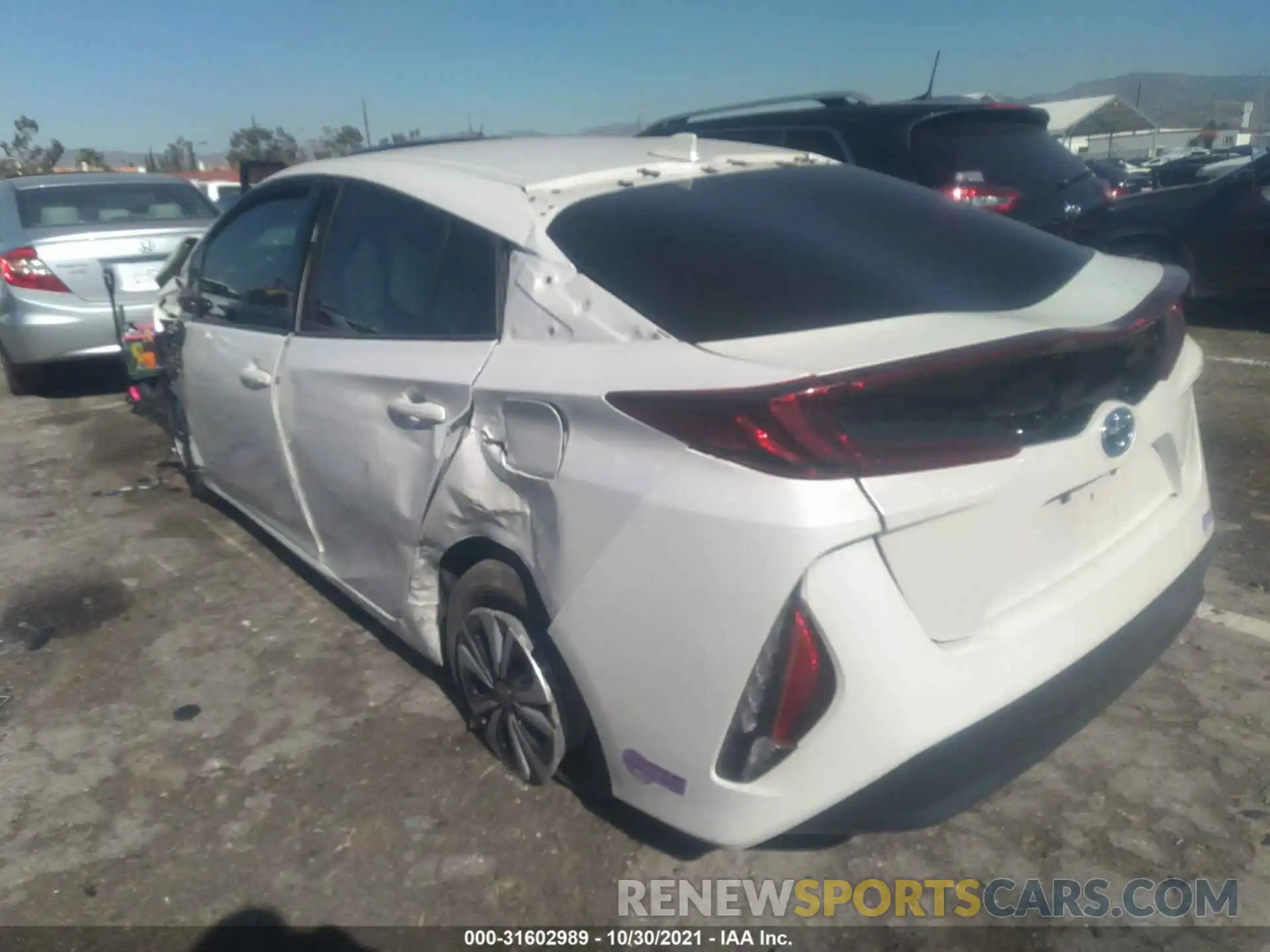 3 Photograph of a damaged car JTDKARFP4K3116396 TOYOTA PRIUS PRIME 2019