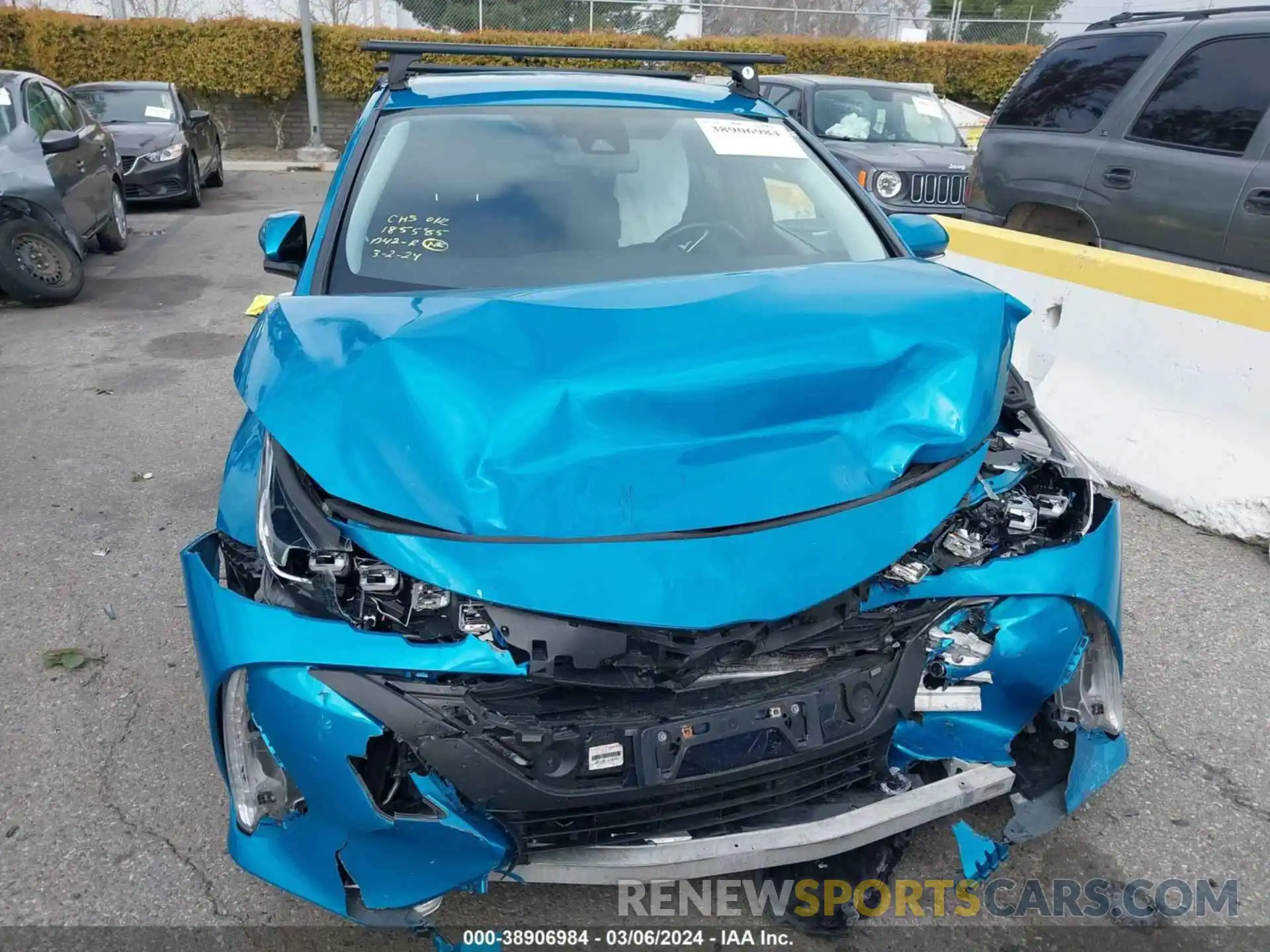 12 Photograph of a damaged car JTDKARFP4K3117547 TOYOTA PRIUS PRIME 2019