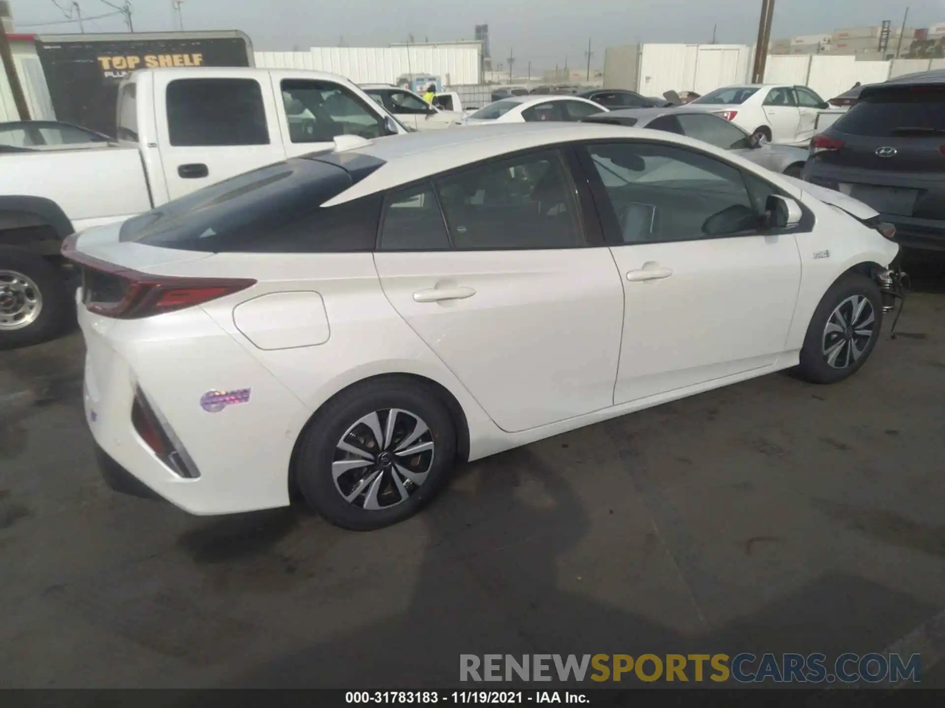 4 Photograph of a damaged car JTDKARFP4K3118200 TOYOTA PRIUS PRIME 2019