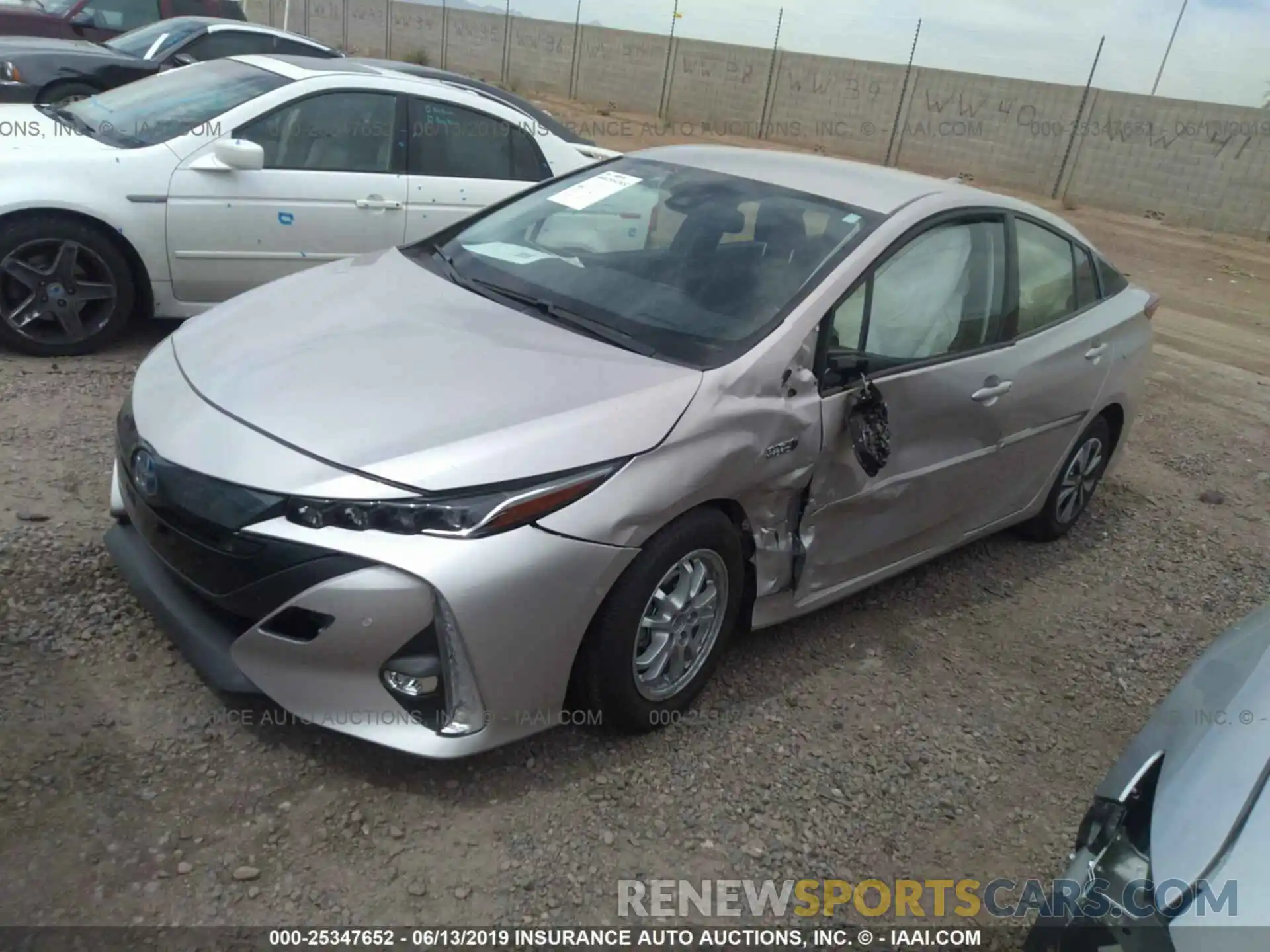 2 Photograph of a damaged car JTDKARFP5K3105245 TOYOTA PRIUS PRIME 2019