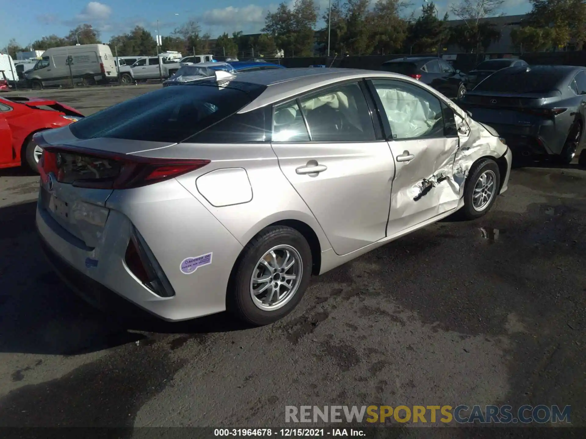 4 Photograph of a damaged car JTDKARFP5K3110431 TOYOTA PRIUS PRIME 2019