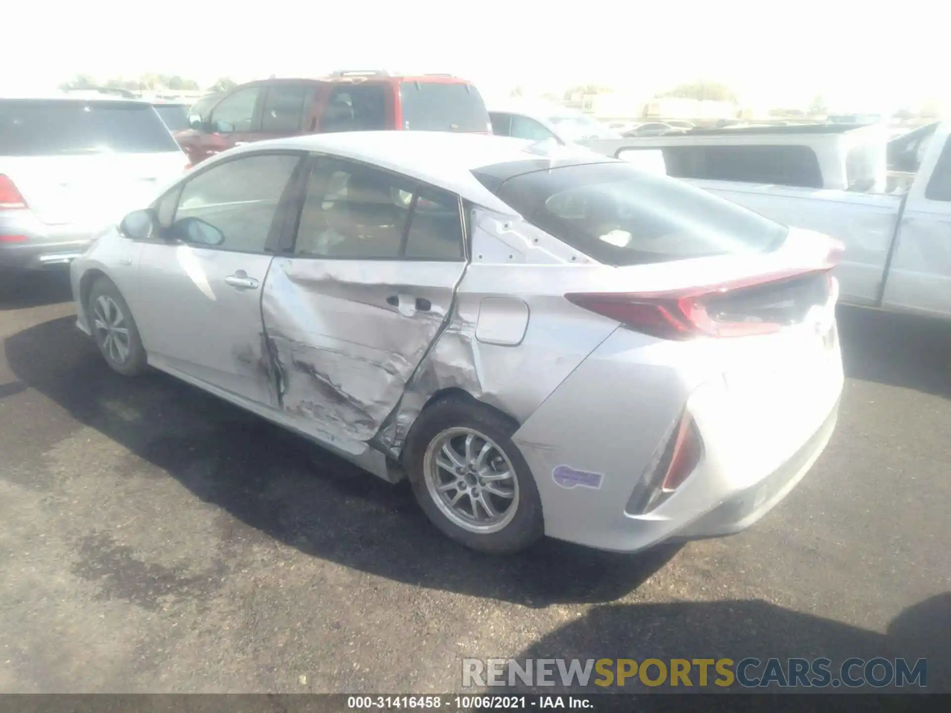 3 Photograph of a damaged car JTDKARFP5K3110509 TOYOTA PRIUS PRIME 2019