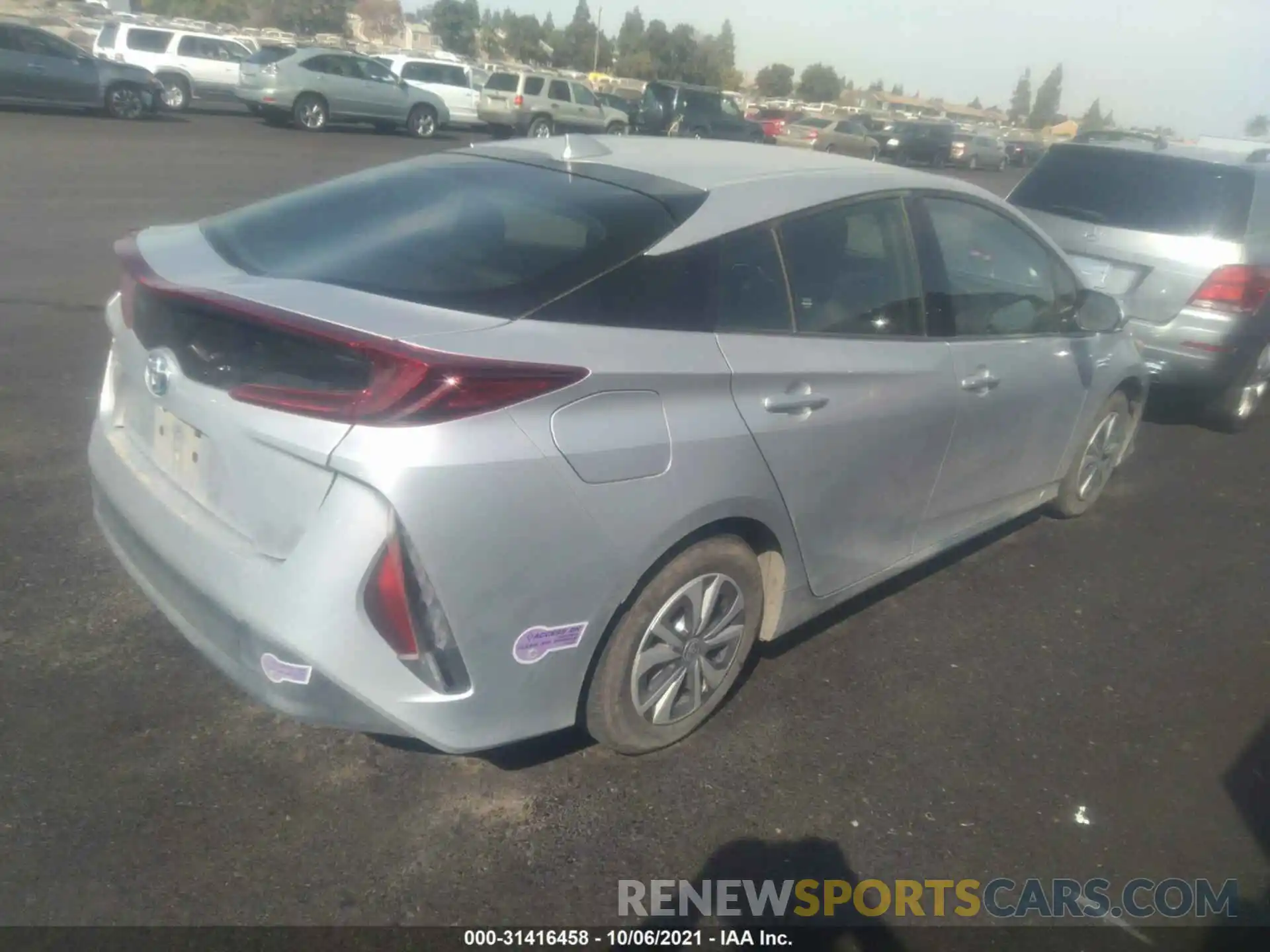 4 Photograph of a damaged car JTDKARFP5K3110509 TOYOTA PRIUS PRIME 2019