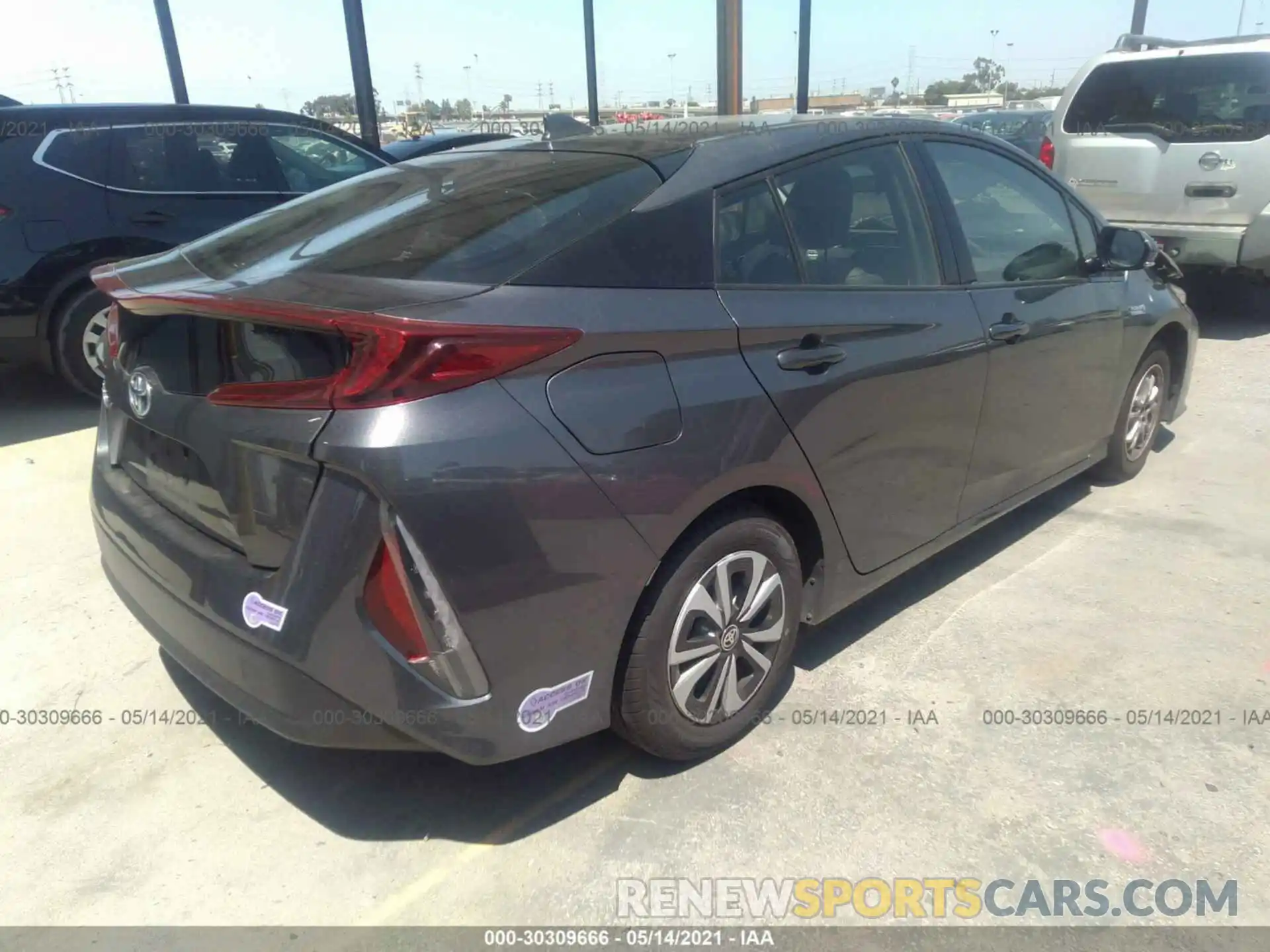 4 Photograph of a damaged car JTDKARFP5K3111420 TOYOTA PRIUS PRIME 2019