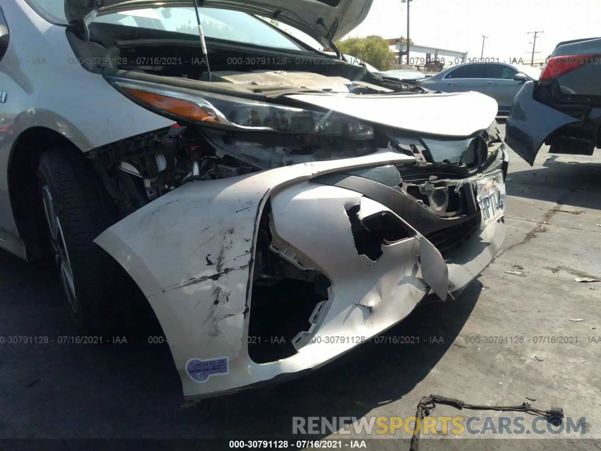 12 Photograph of a damaged car JTDKARFP6K3104900 TOYOTA PRIUS PRIME 2019