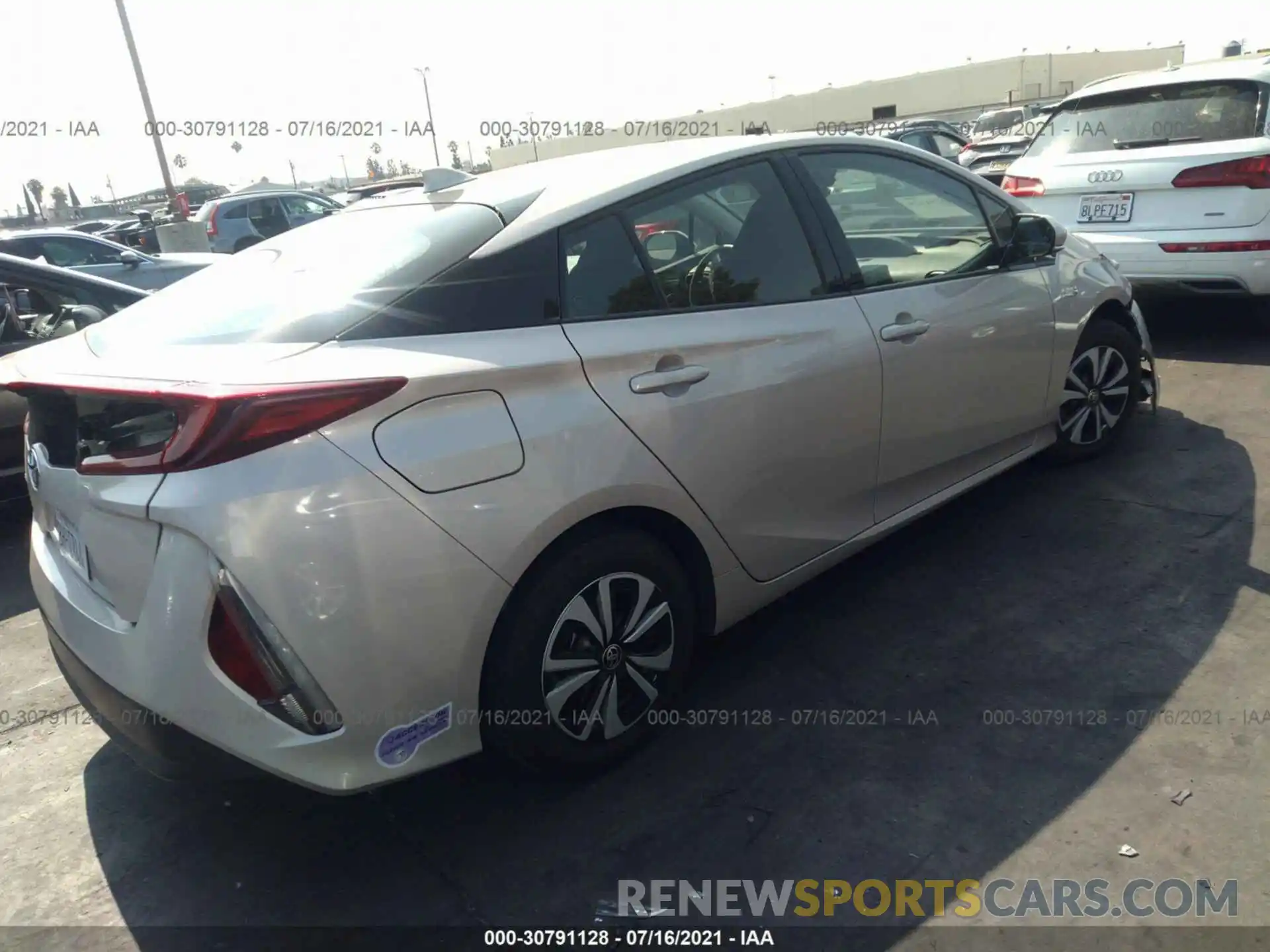 4 Photograph of a damaged car JTDKARFP6K3104900 TOYOTA PRIUS PRIME 2019