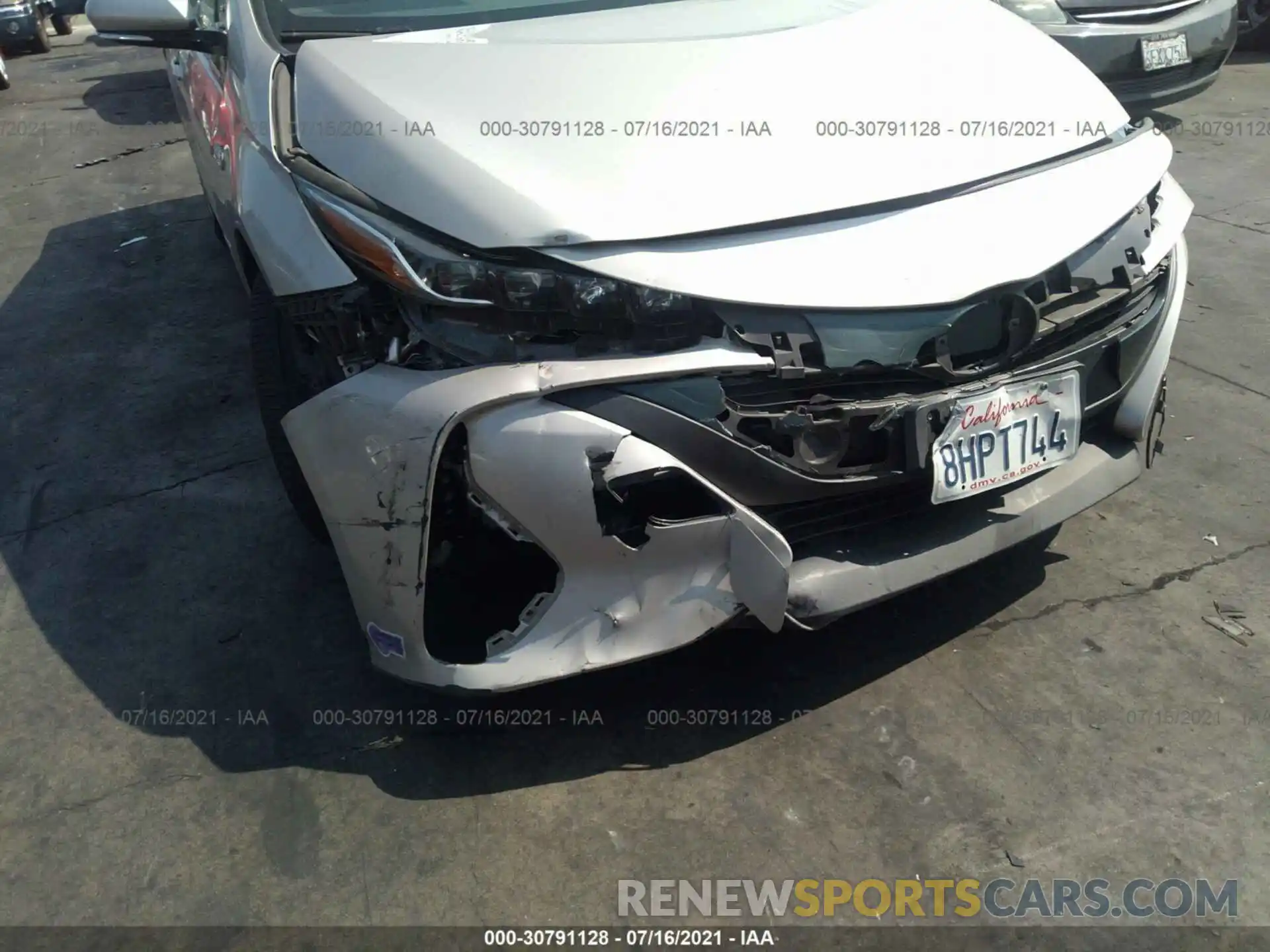 6 Photograph of a damaged car JTDKARFP6K3104900 TOYOTA PRIUS PRIME 2019