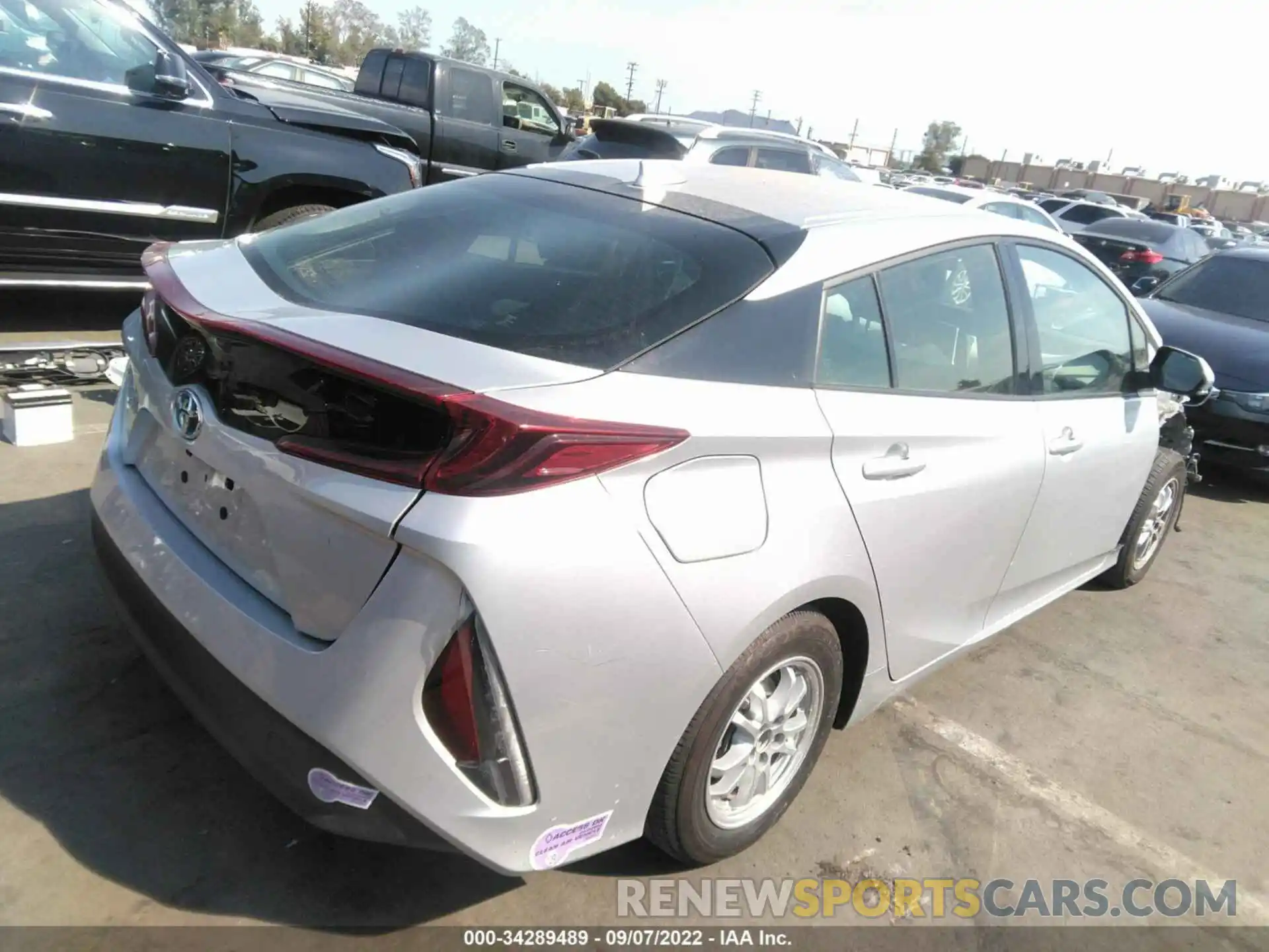 4 Photograph of a damaged car JTDKARFP6K3111491 TOYOTA PRIUS PRIME 2019