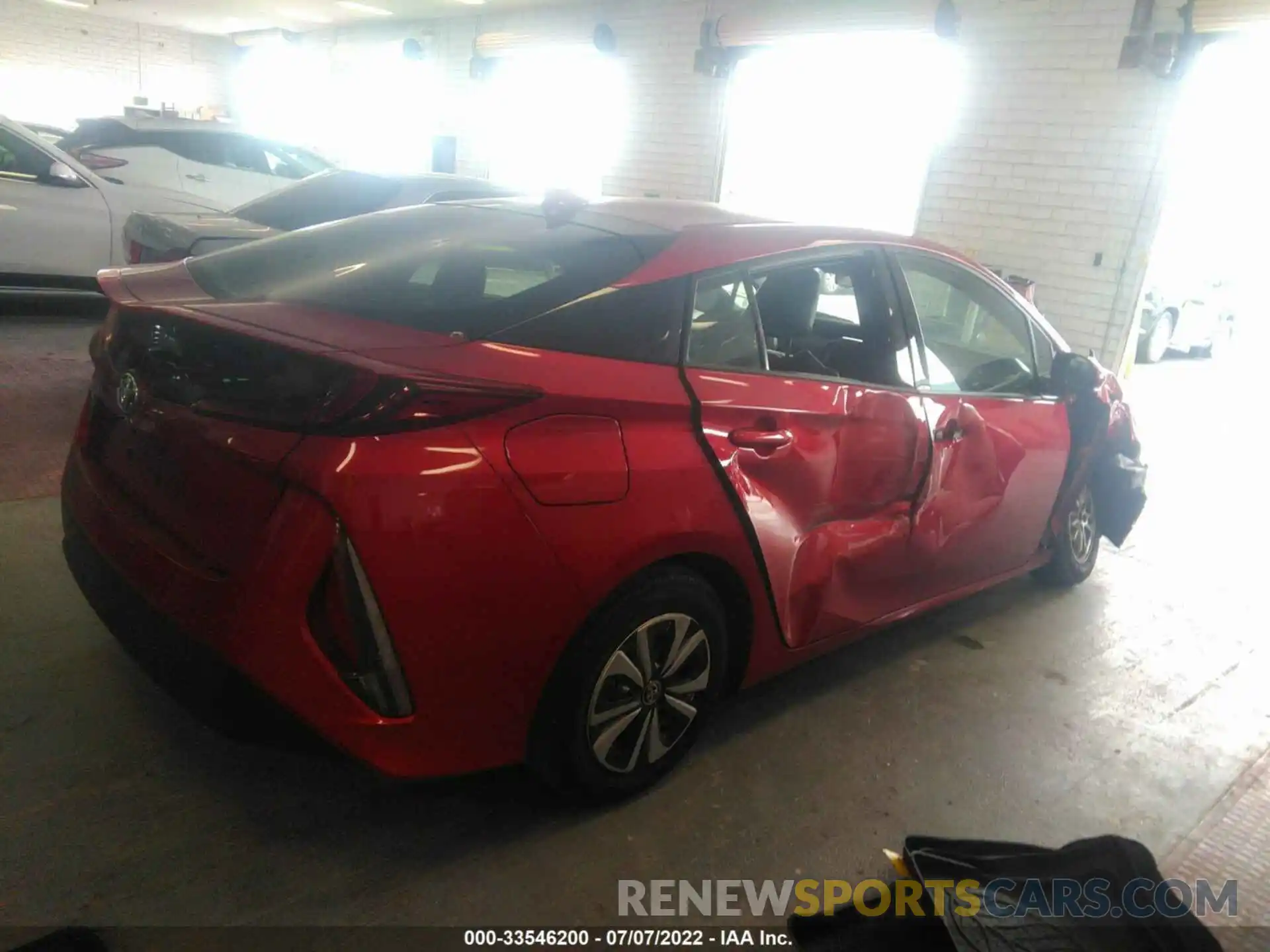 4 Photograph of a damaged car JTDKARFP6K3112575 TOYOTA PRIUS PRIME 2019