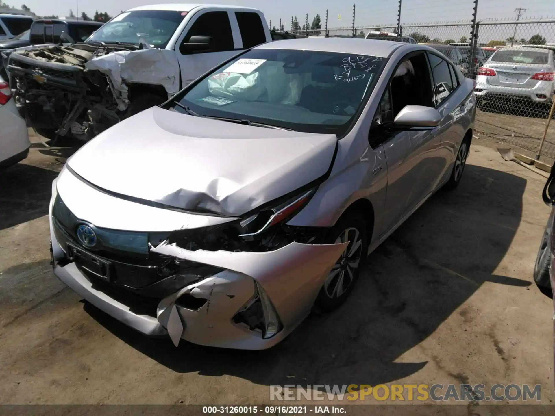 2 Photograph of a damaged car JTDKARFP7K3109457 TOYOTA PRIUS PRIME 2019