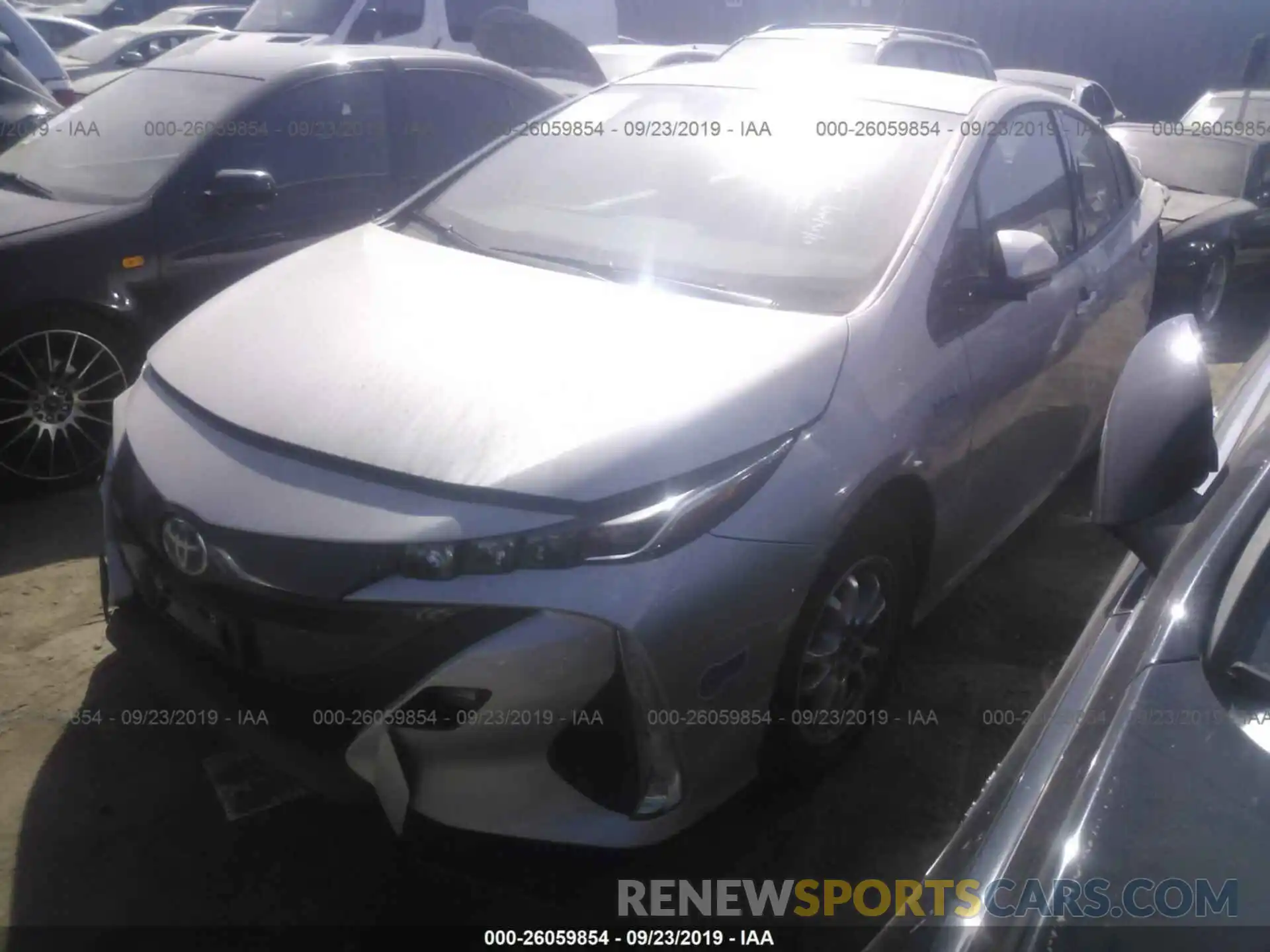 2 Photograph of a damaged car JTDKARFP7K3109832 TOYOTA PRIUS PRIME 2019