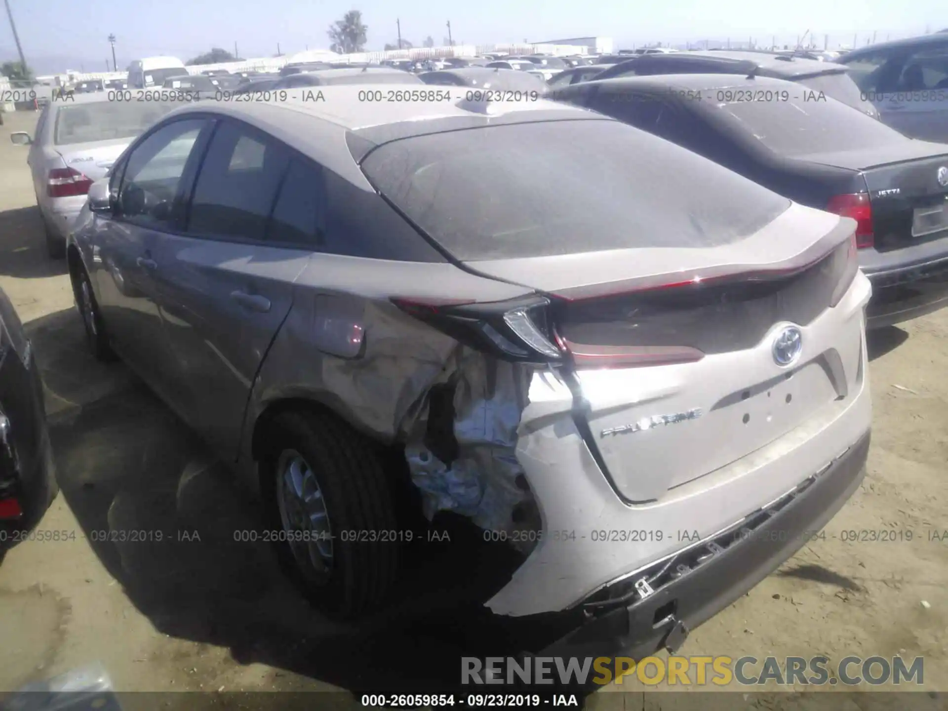 3 Photograph of a damaged car JTDKARFP7K3109832 TOYOTA PRIUS PRIME 2019