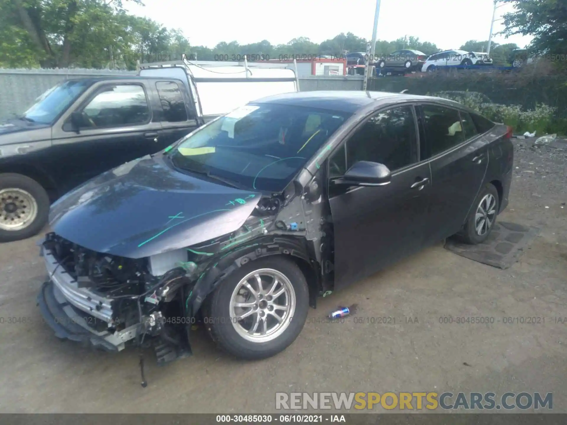 2 Photograph of a damaged car JTDKARFP7K3111712 TOYOTA PRIUS PRIME 2019