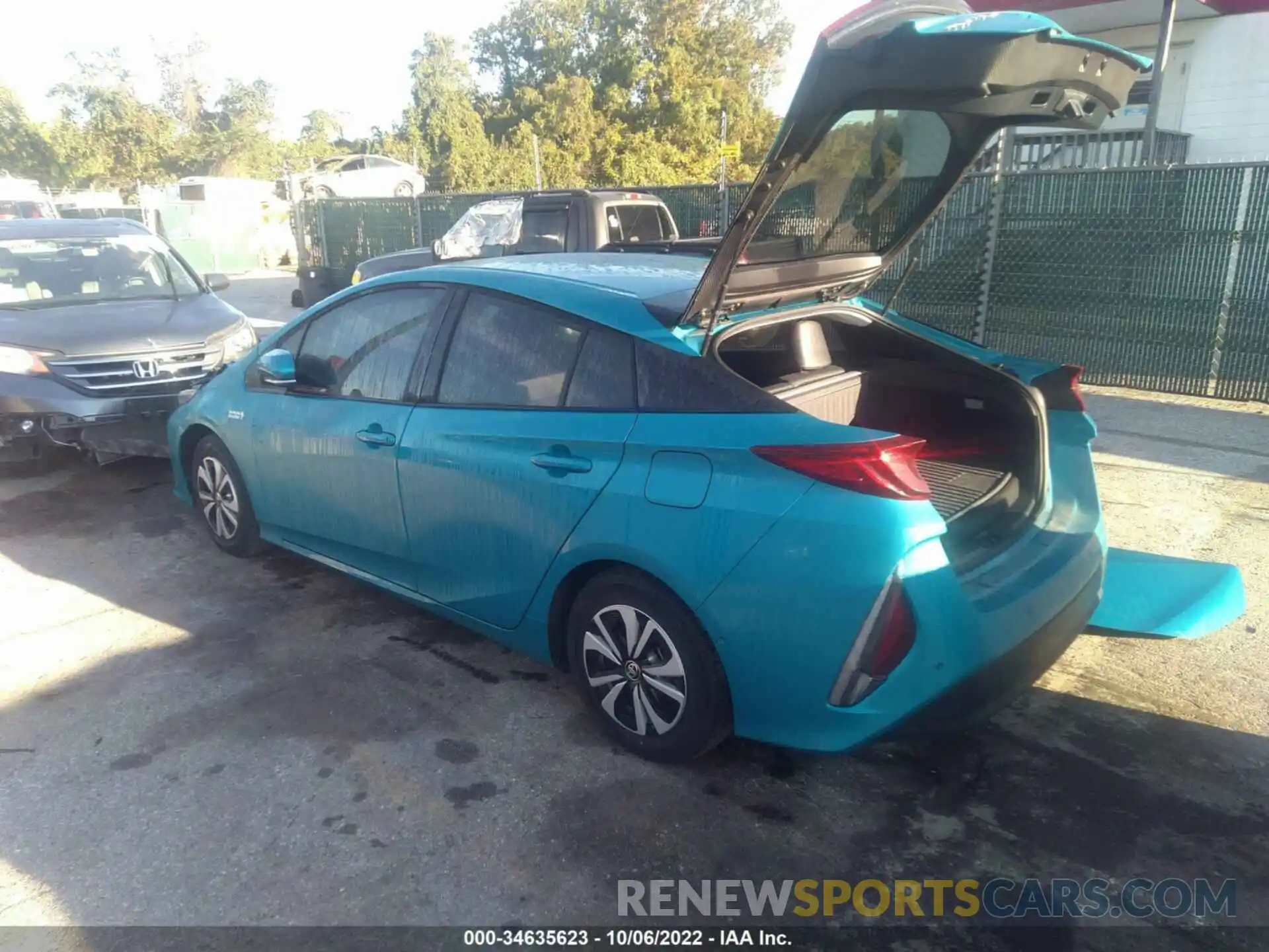 3 Photograph of a damaged car JTDKARFP7K3112200 TOYOTA PRIUS PRIME 2019