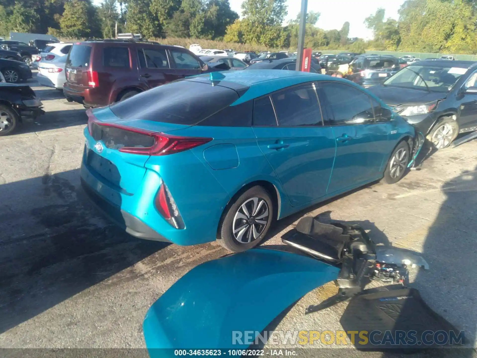 4 Photograph of a damaged car JTDKARFP7K3112200 TOYOTA PRIUS PRIME 2019