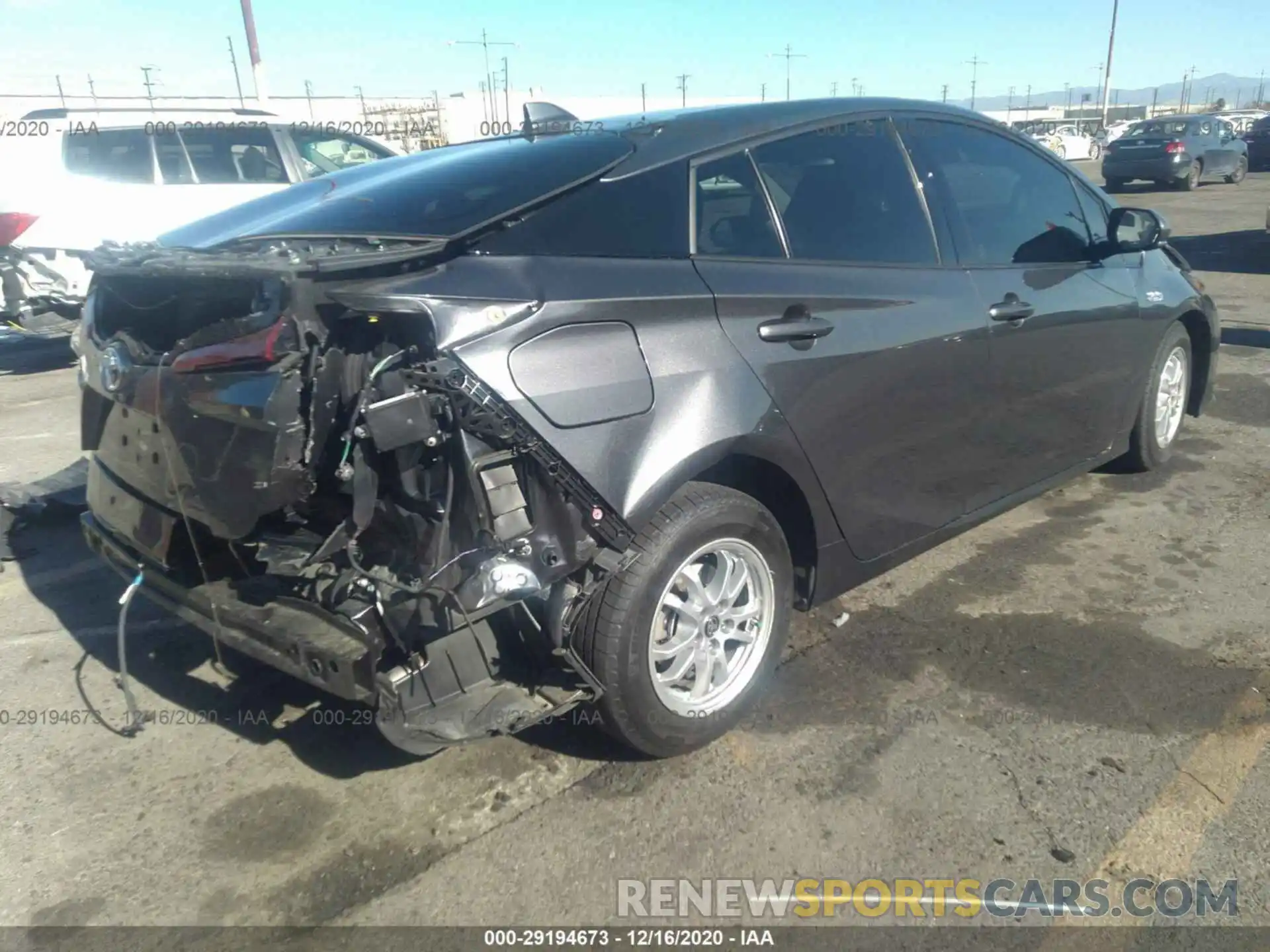 4 Photograph of a damaged car JTDKARFP7K3115274 TOYOTA PRIUS PRIME 2019