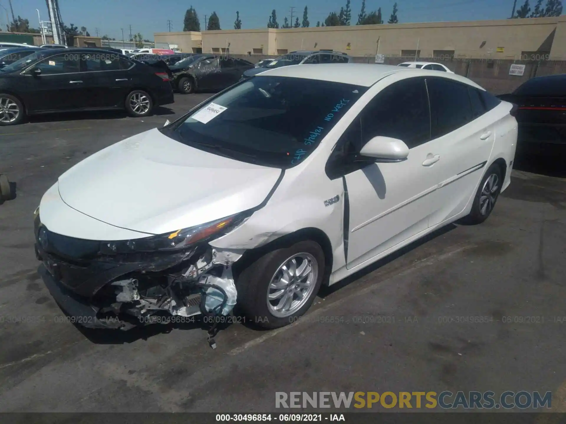 2 Photograph of a damaged car JTDKARFP7K3117123 TOYOTA PRIUS PRIME 2019