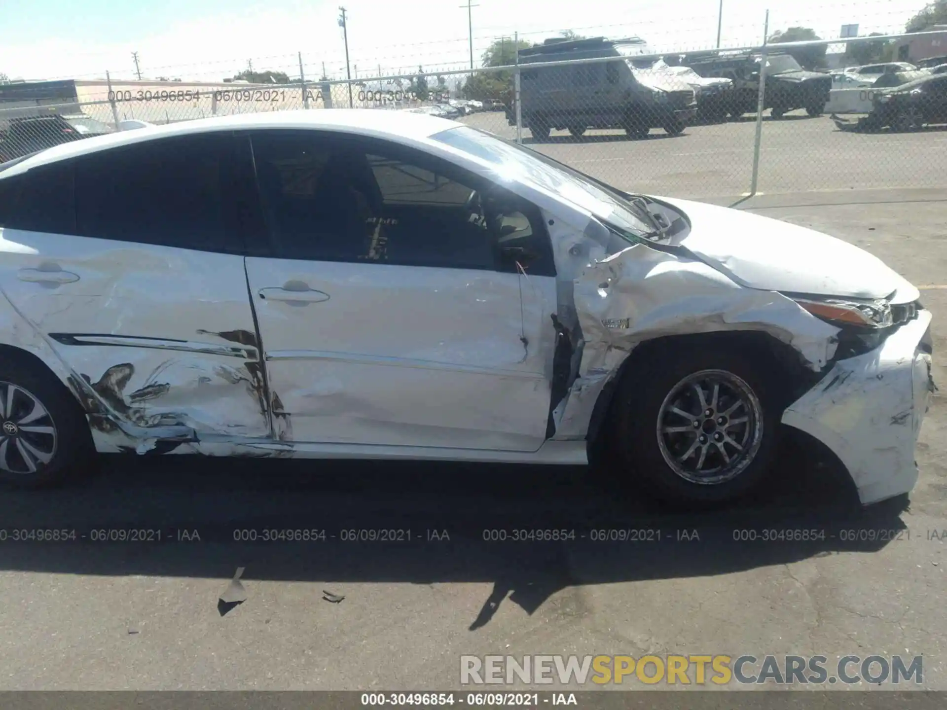 6 Photograph of a damaged car JTDKARFP7K3117123 TOYOTA PRIUS PRIME 2019