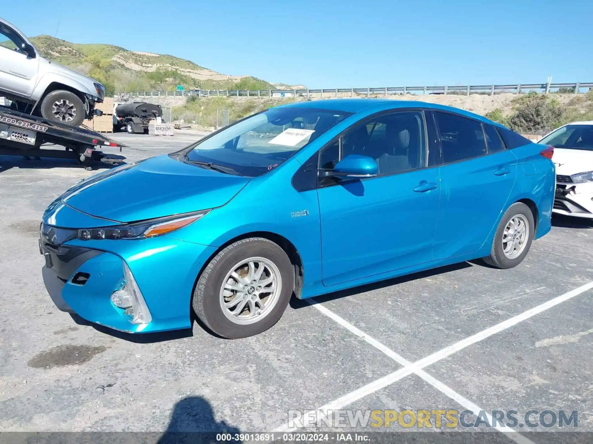 2 Photograph of a damaged car JTDKARFP8K3105711 TOYOTA PRIUS PRIME 2019