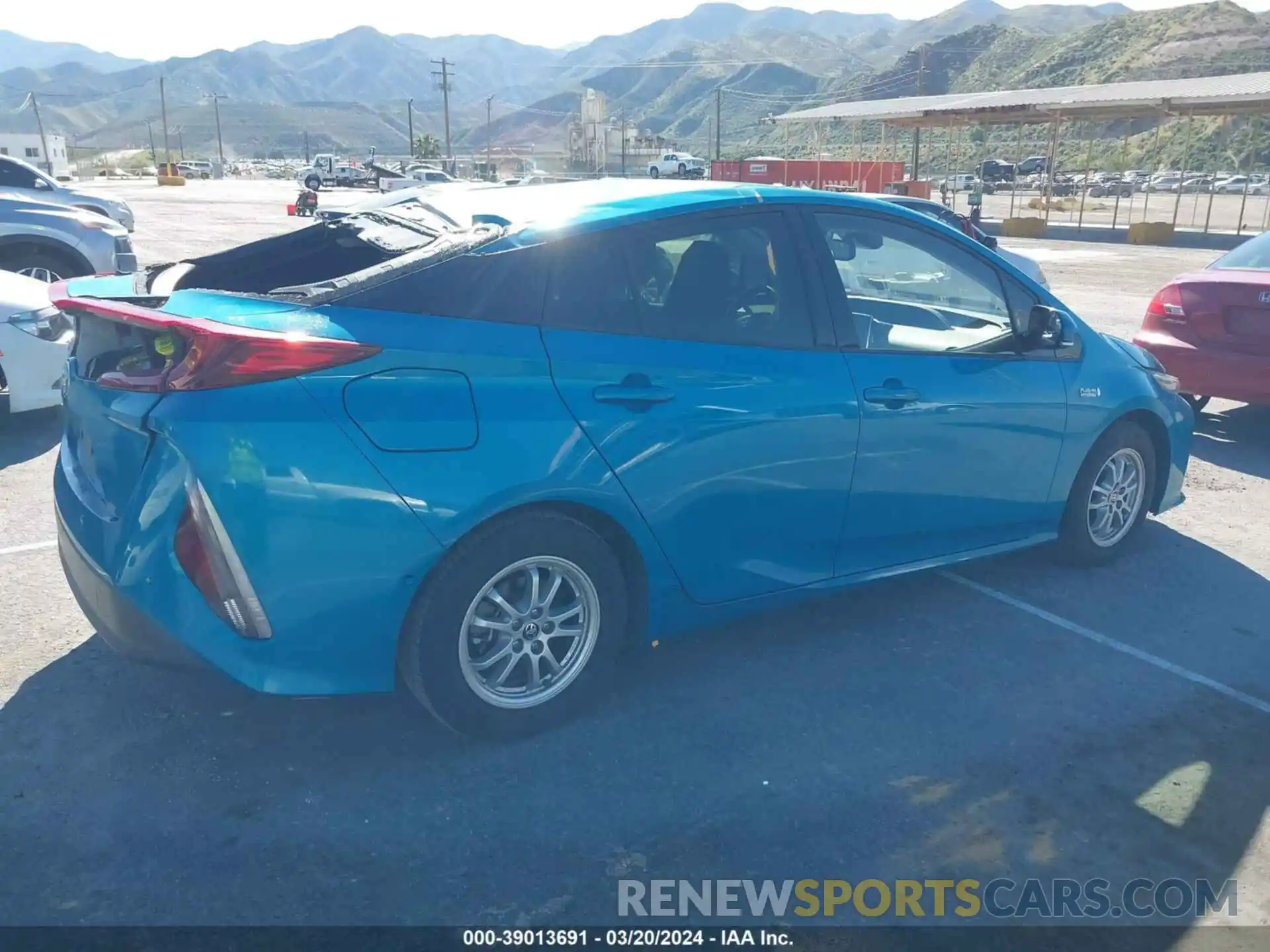 4 Photograph of a damaged car JTDKARFP8K3105711 TOYOTA PRIUS PRIME 2019