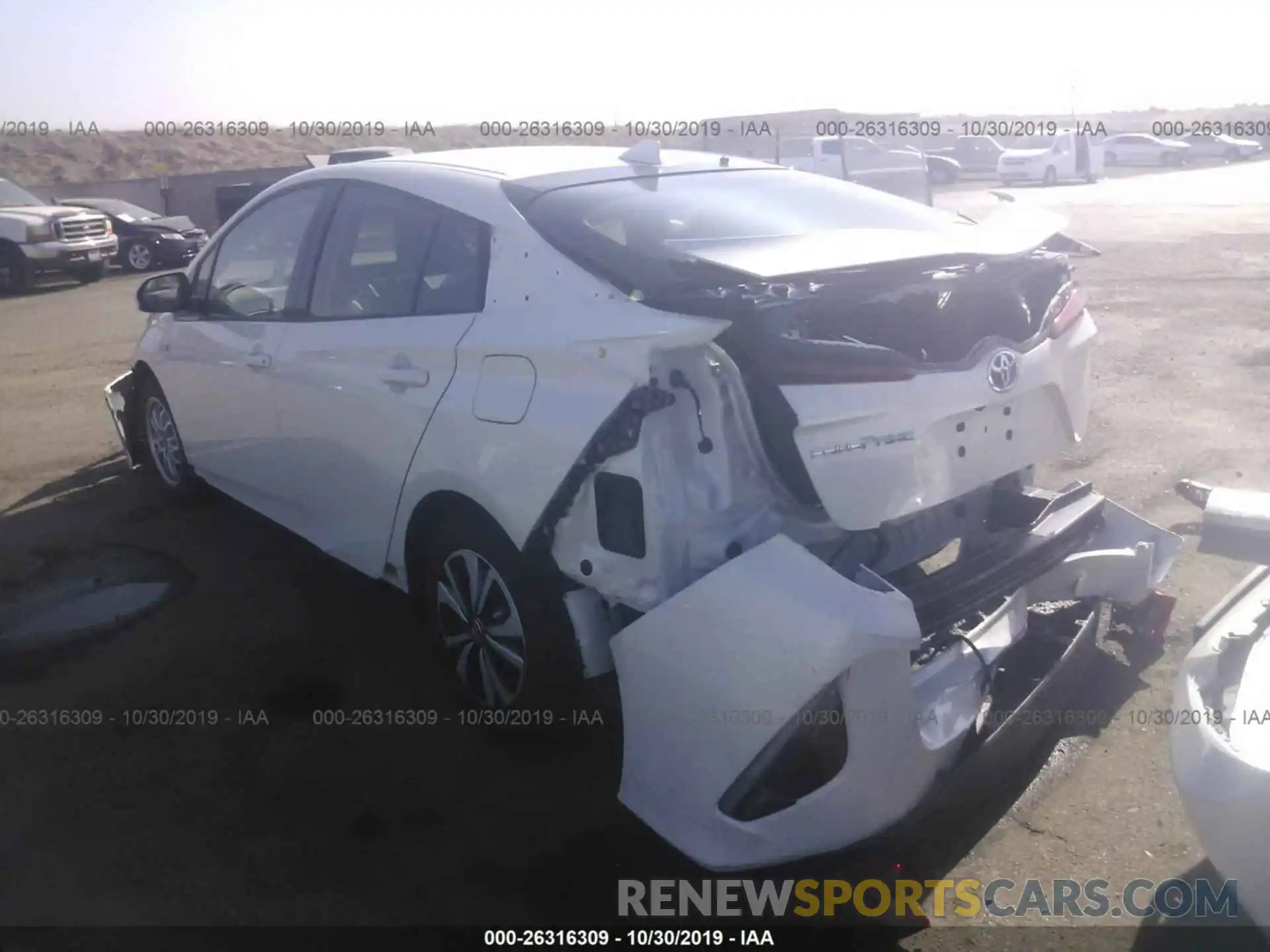 3 Photograph of a damaged car JTDKARFP8K3105806 TOYOTA PRIUS PRIME 2019