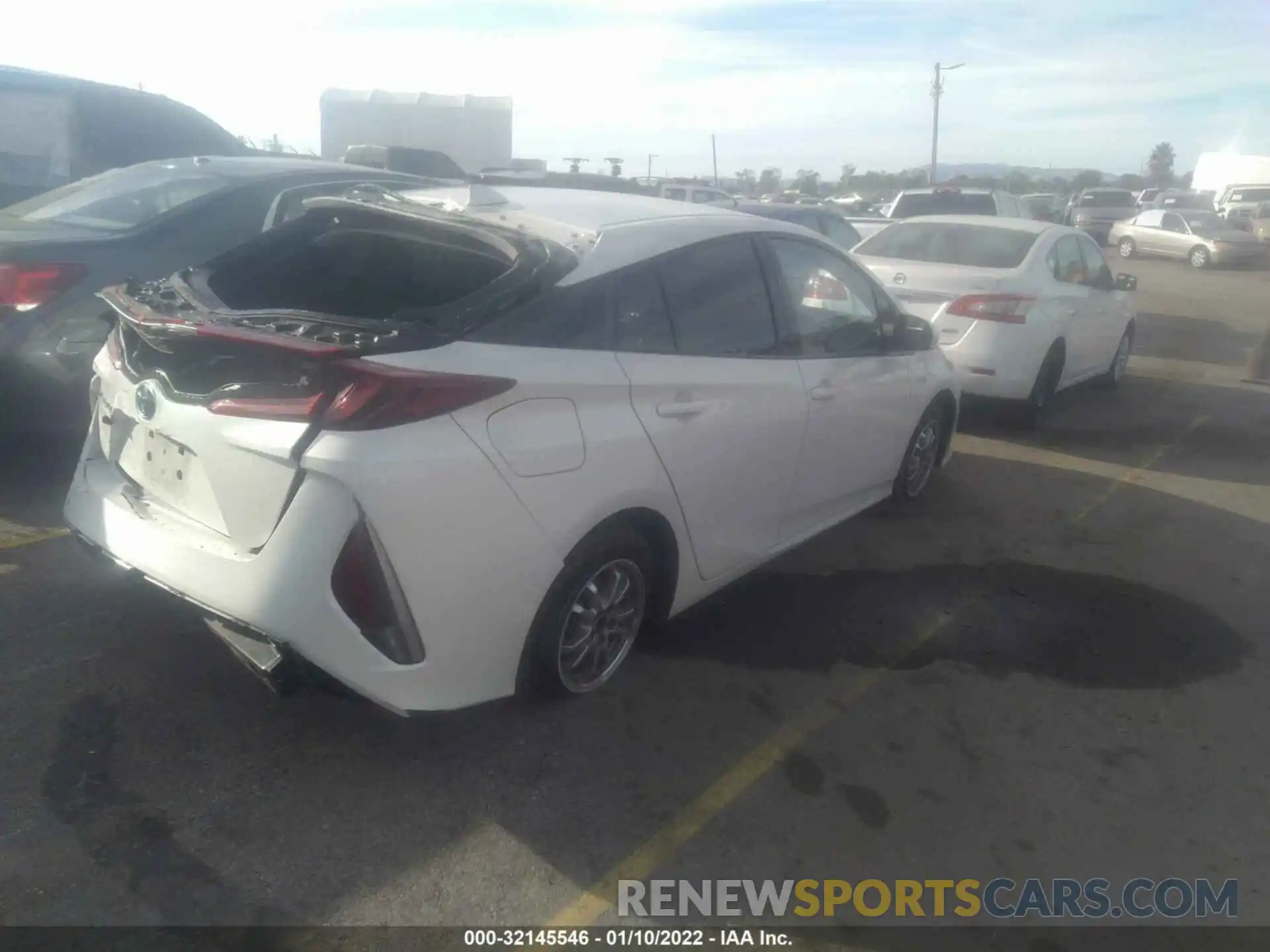 4 Photograph of a damaged car JTDKARFP8K3112013 TOYOTA PRIUS PRIME 2019