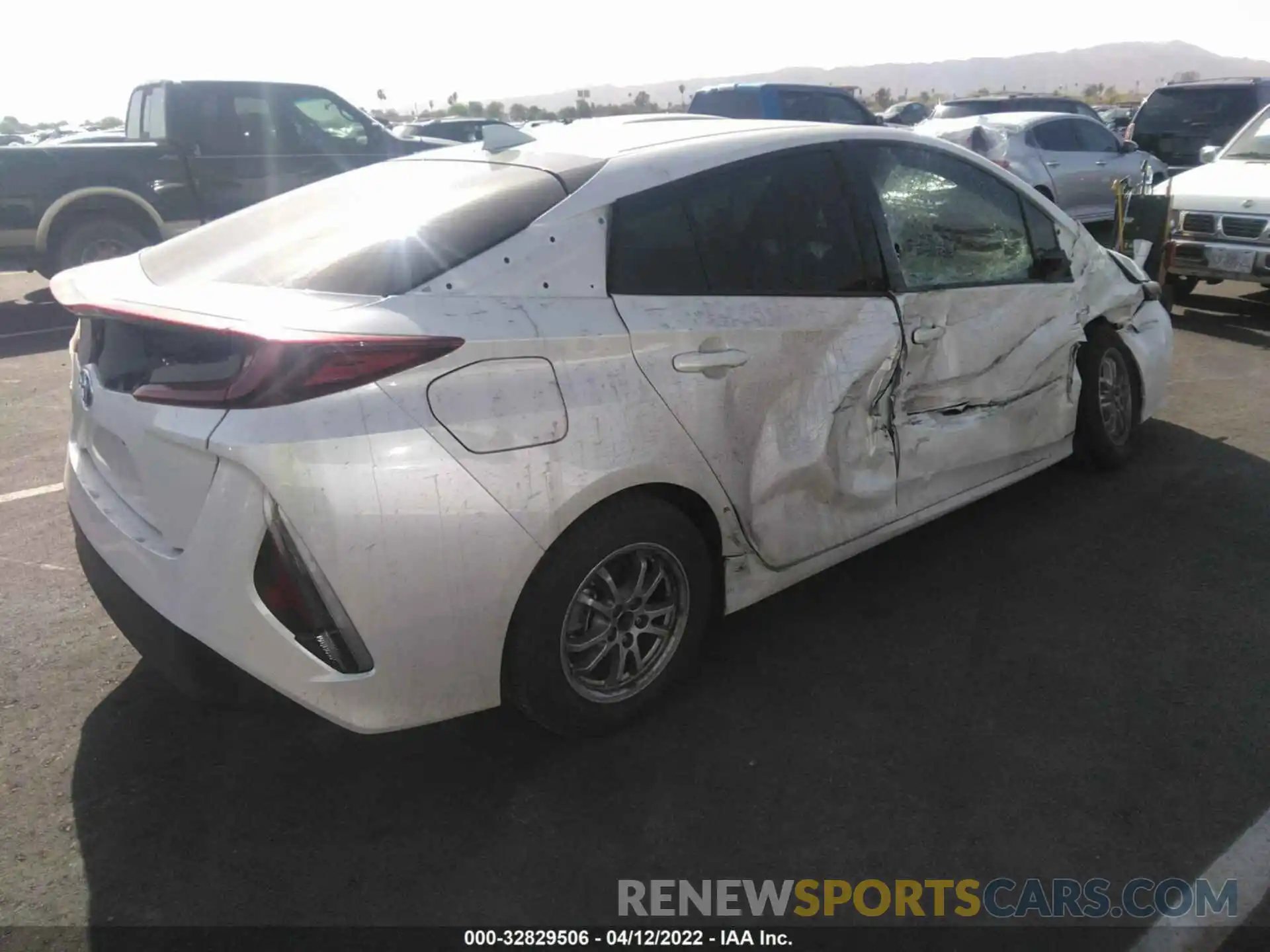 4 Photograph of a damaged car JTDKARFP9K3108570 TOYOTA PRIUS PRIME 2019