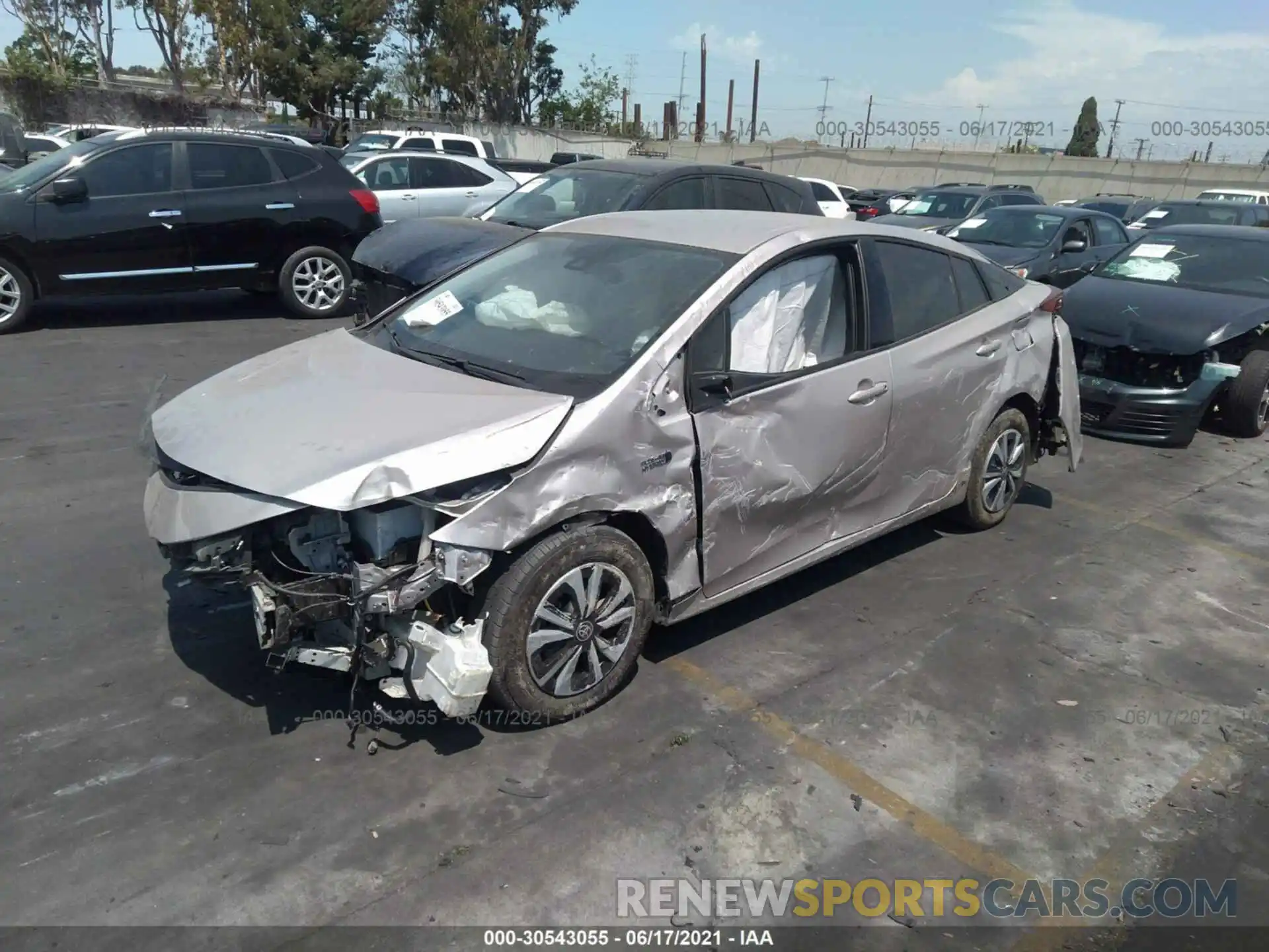 2 Photograph of a damaged car JTDKARFP9K3110982 TOYOTA PRIUS PRIME 2019