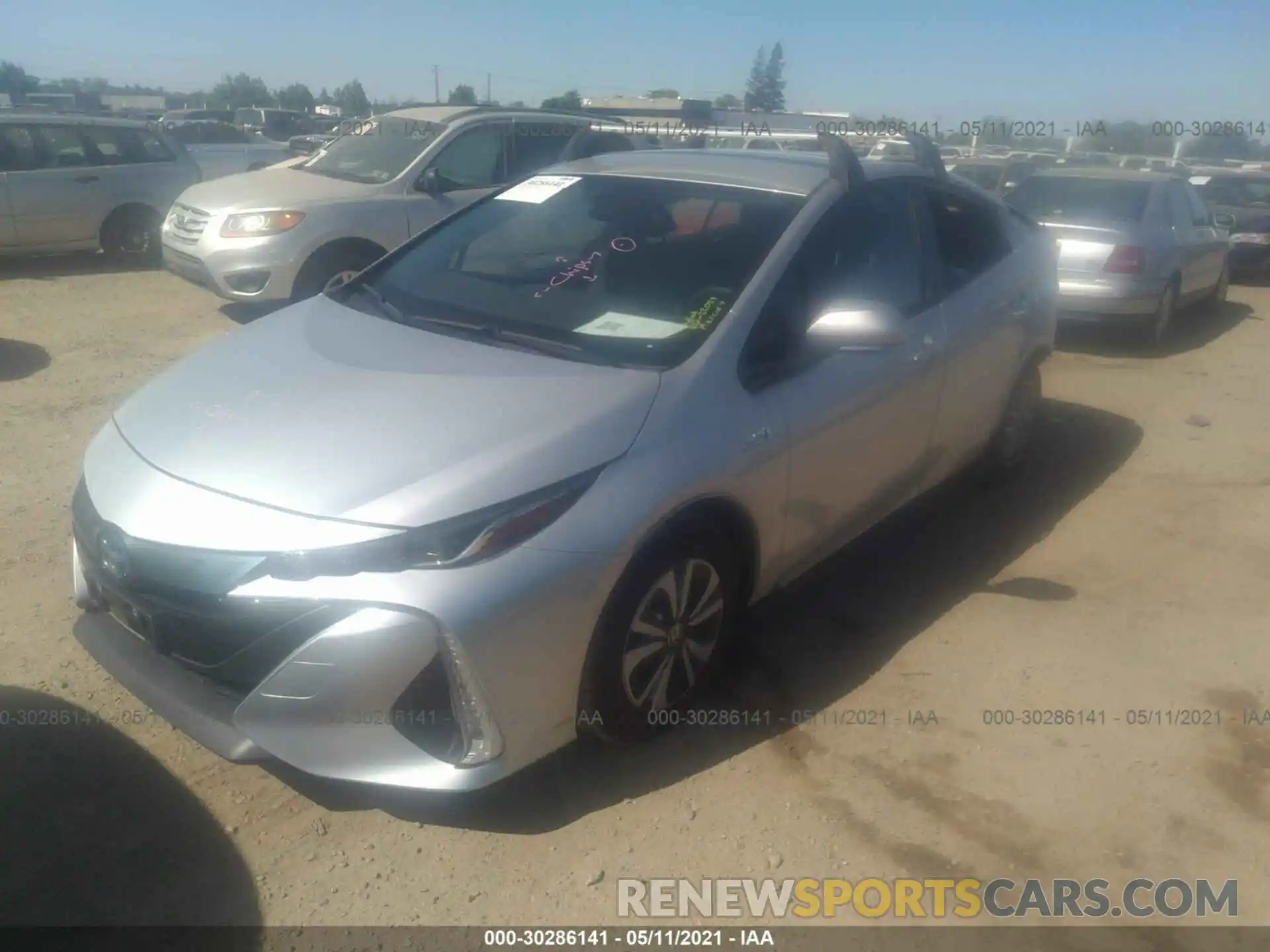 2 Photograph of a damaged car JTDKARFP9K3113493 TOYOTA PRIUS PRIME 2019