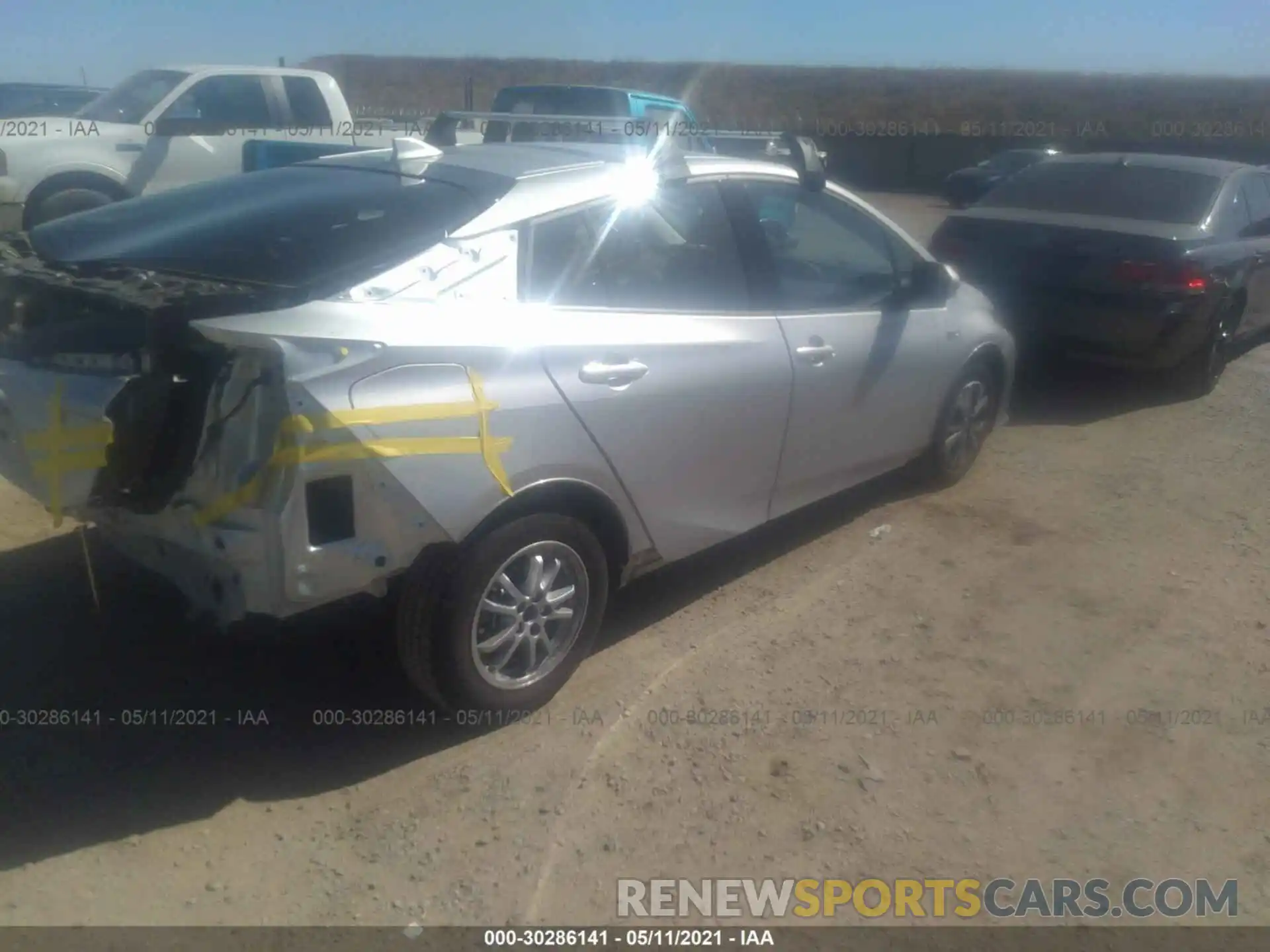 4 Photograph of a damaged car JTDKARFP9K3113493 TOYOTA PRIUS PRIME 2019