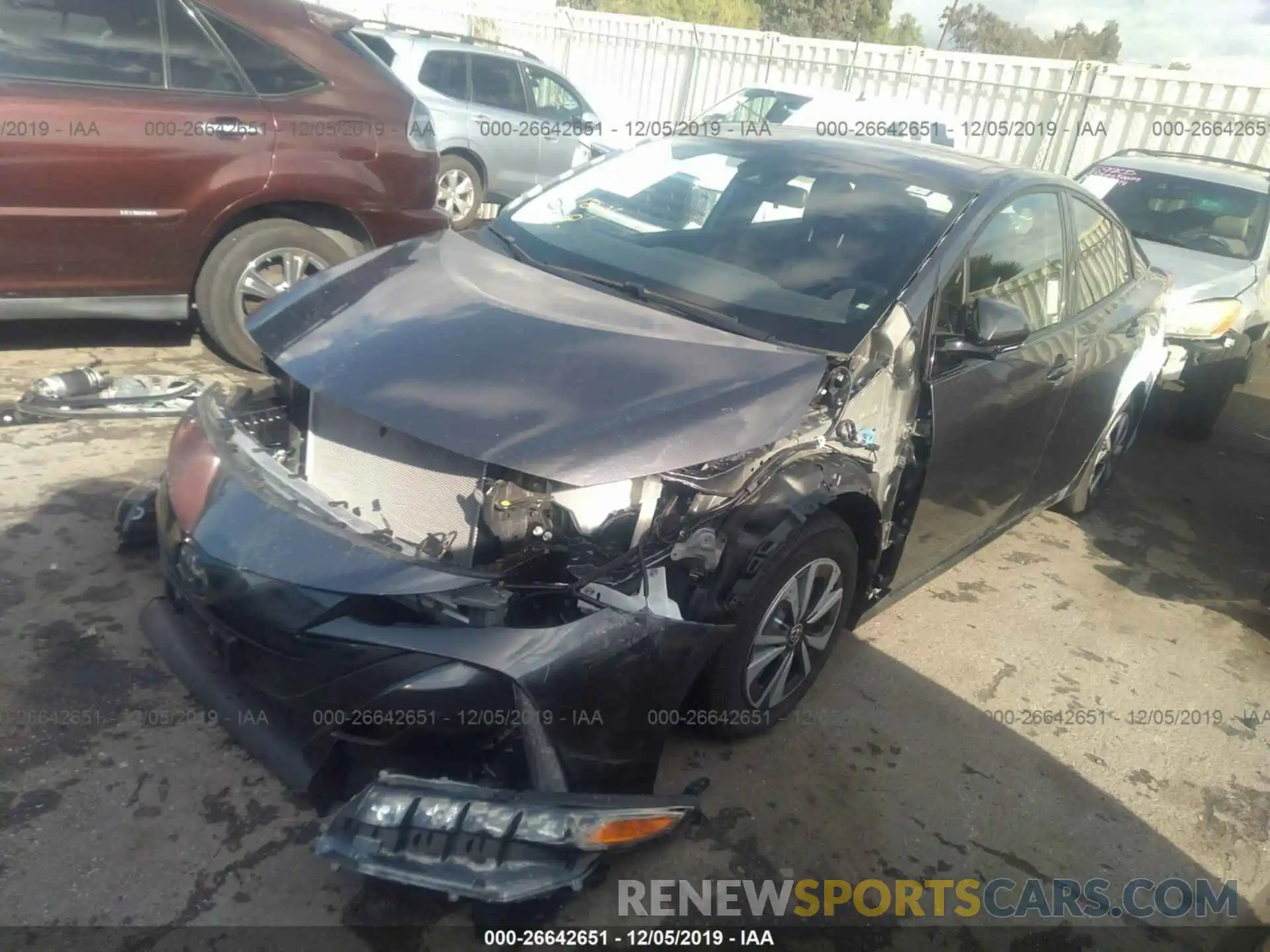 2 Photograph of a damaged car JTDKARFPXK3115303 TOYOTA PRIUS PRIME 2019