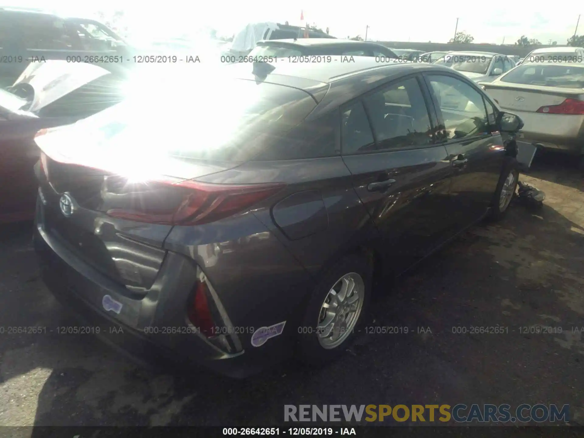 4 Photograph of a damaged car JTDKARFPXK3115303 TOYOTA PRIUS PRIME 2019