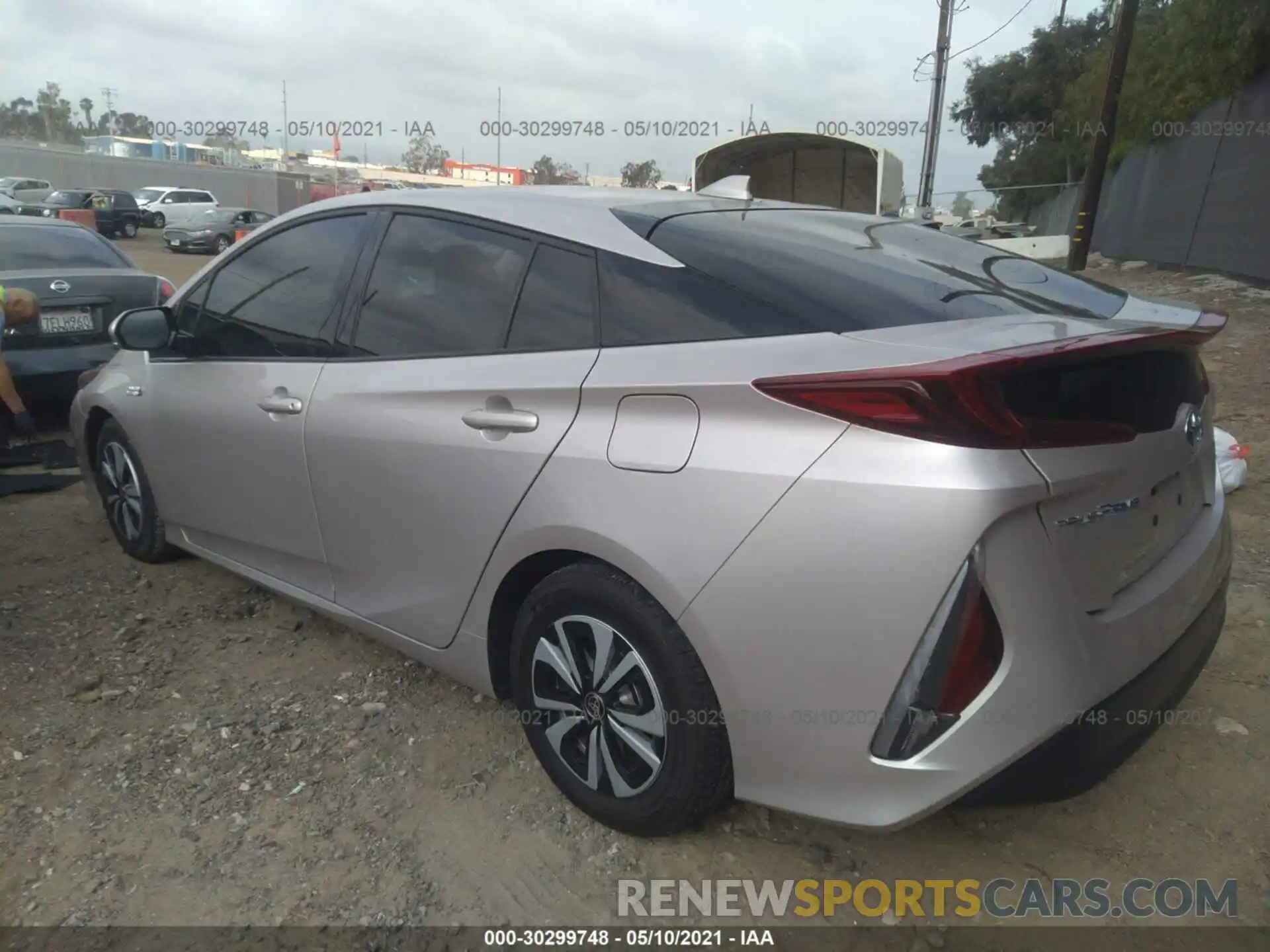 3 Photograph of a damaged car JTDKARFPXK3119559 TOYOTA PRIUS PRIME 2019