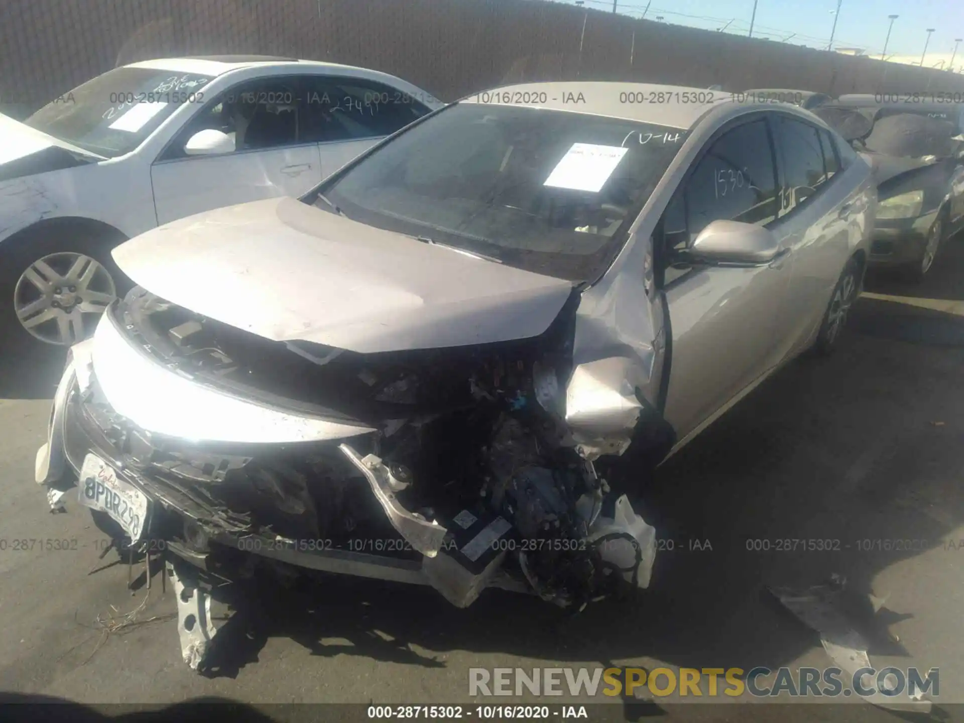 2 Photograph of a damaged car JTDKARFP1L3146599 TOYOTA PRIUS PRIME 2020