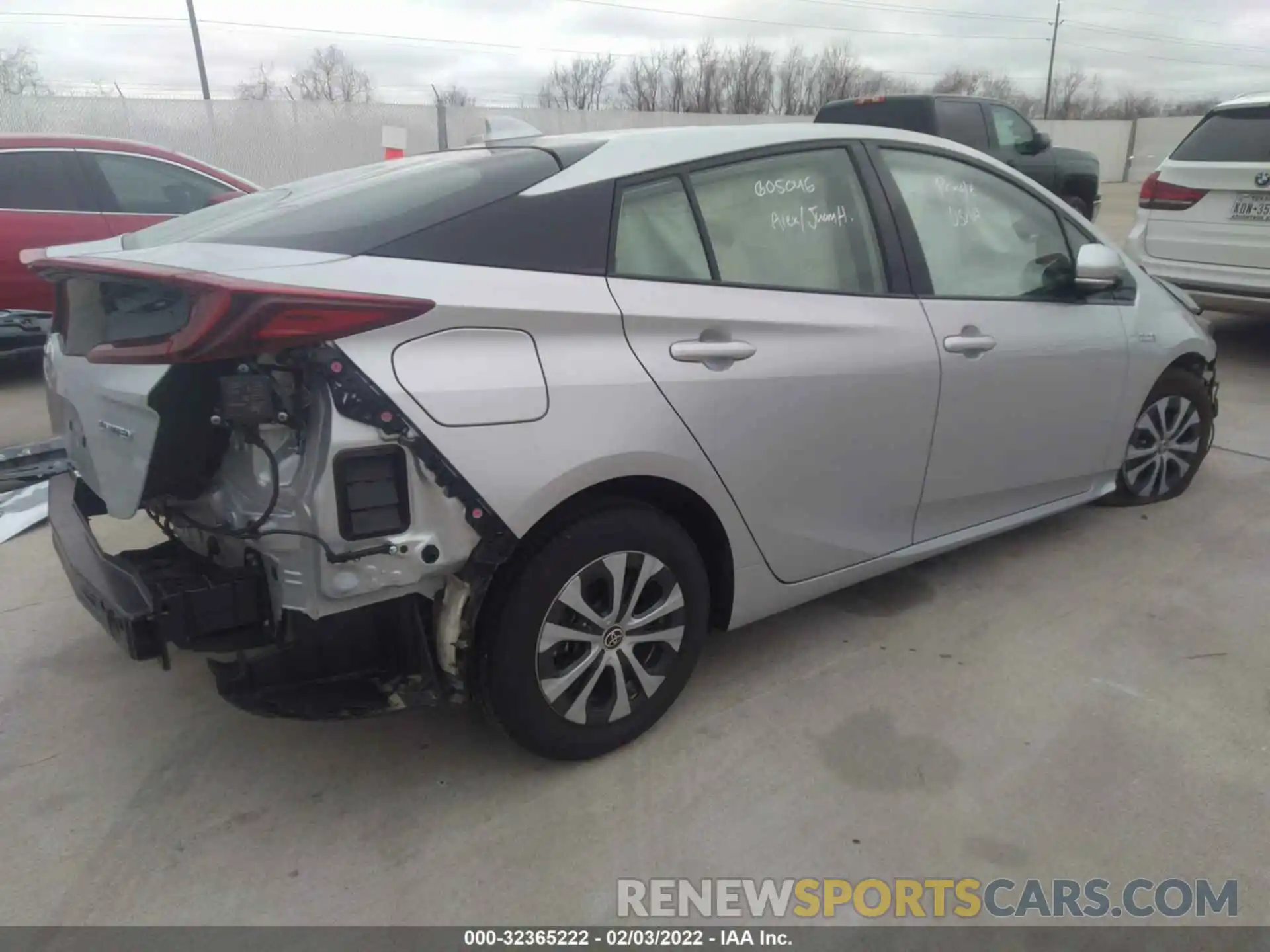 4 Photograph of a damaged car JTDKARFPXL3137559 TOYOTA PRIUS PRIME 2020