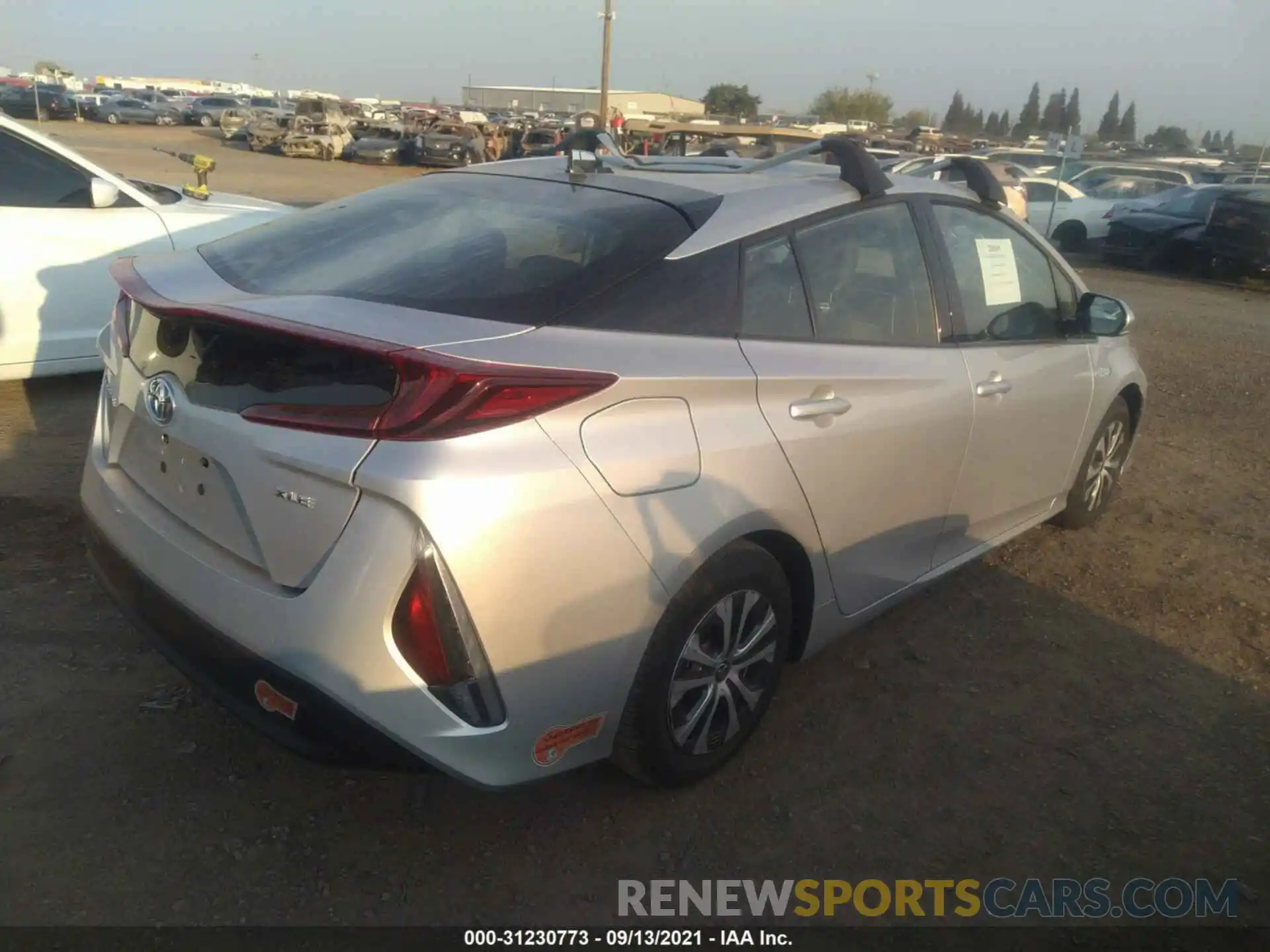 4 Photograph of a damaged car JTDKARFPXL3142633 TOYOTA PRIUS PRIME 2020