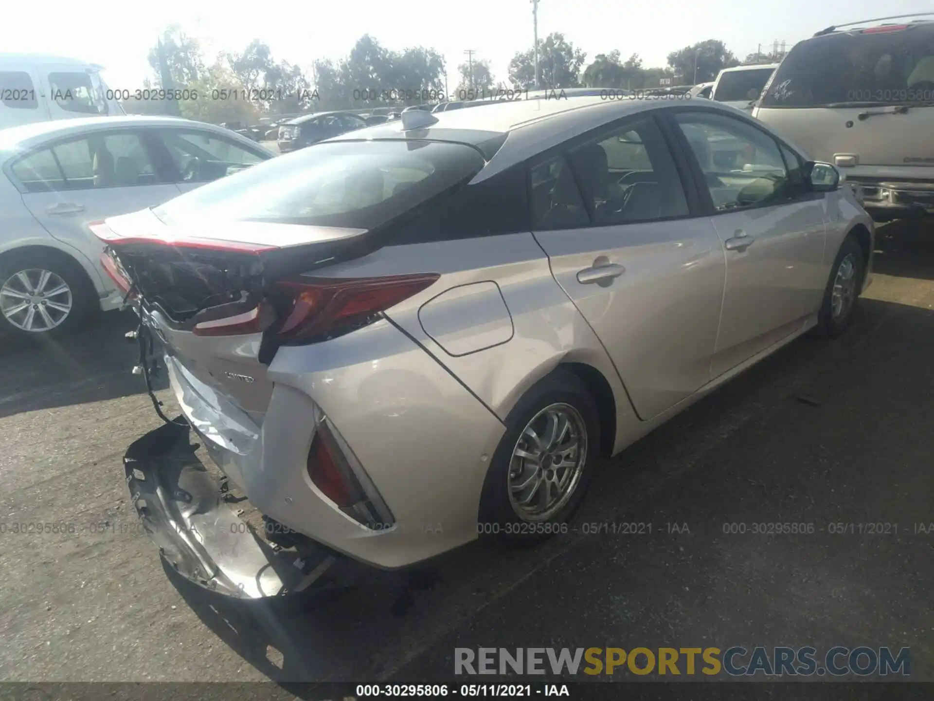 4 Photograph of a damaged car JTDKAMFP1M3167621 TOYOTA PRIUS PRIME 2021