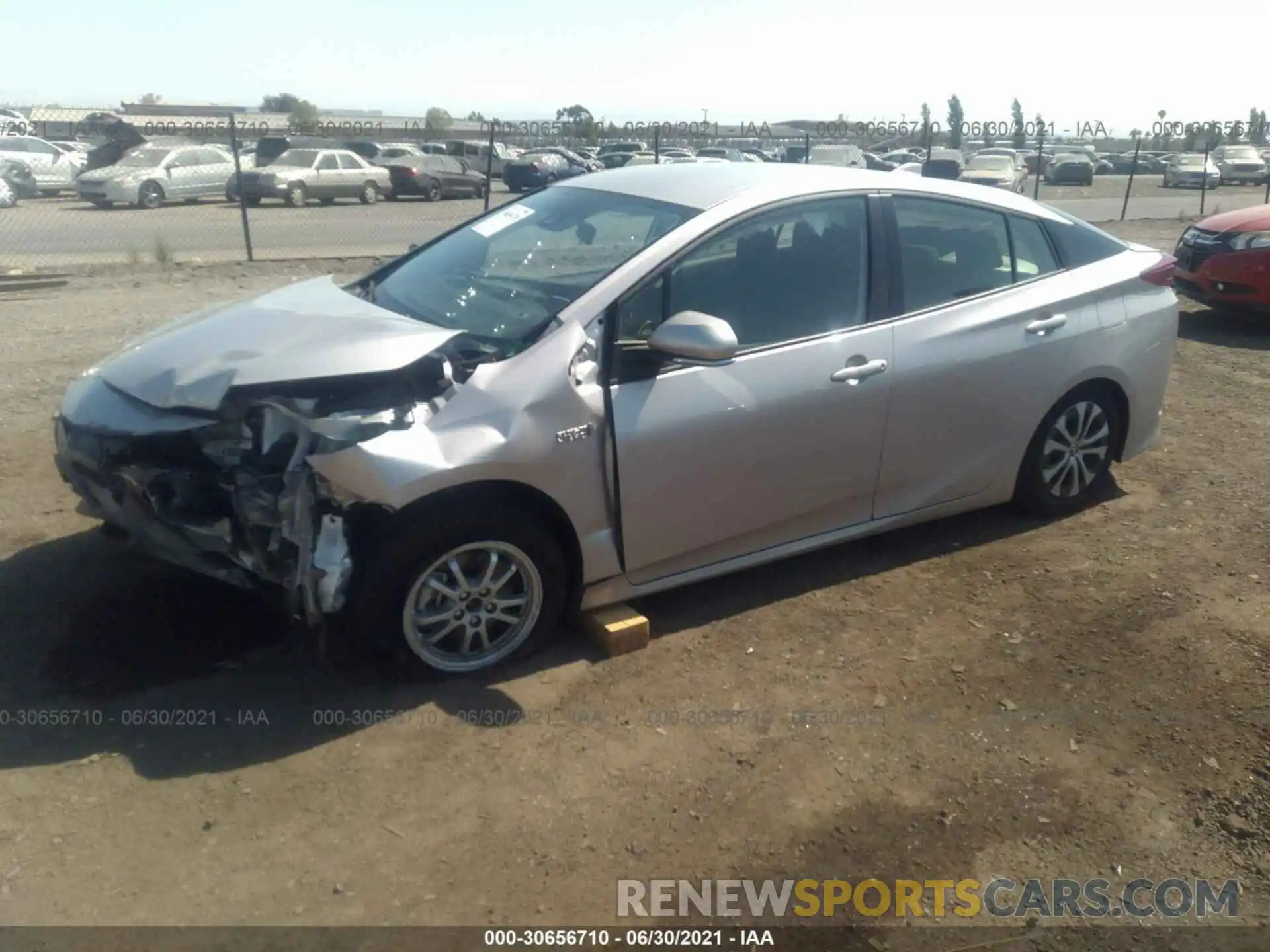 2 Photograph of a damaged car JTDKAMFP1M3169868 TOYOTA PRIUS PRIME 2021