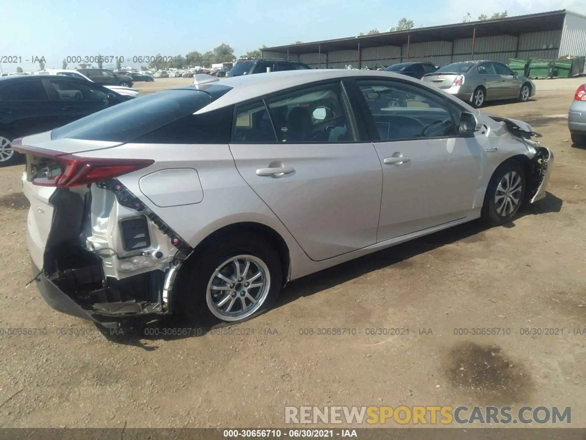 4 Photograph of a damaged car JTDKAMFP1M3169868 TOYOTA PRIUS PRIME 2021