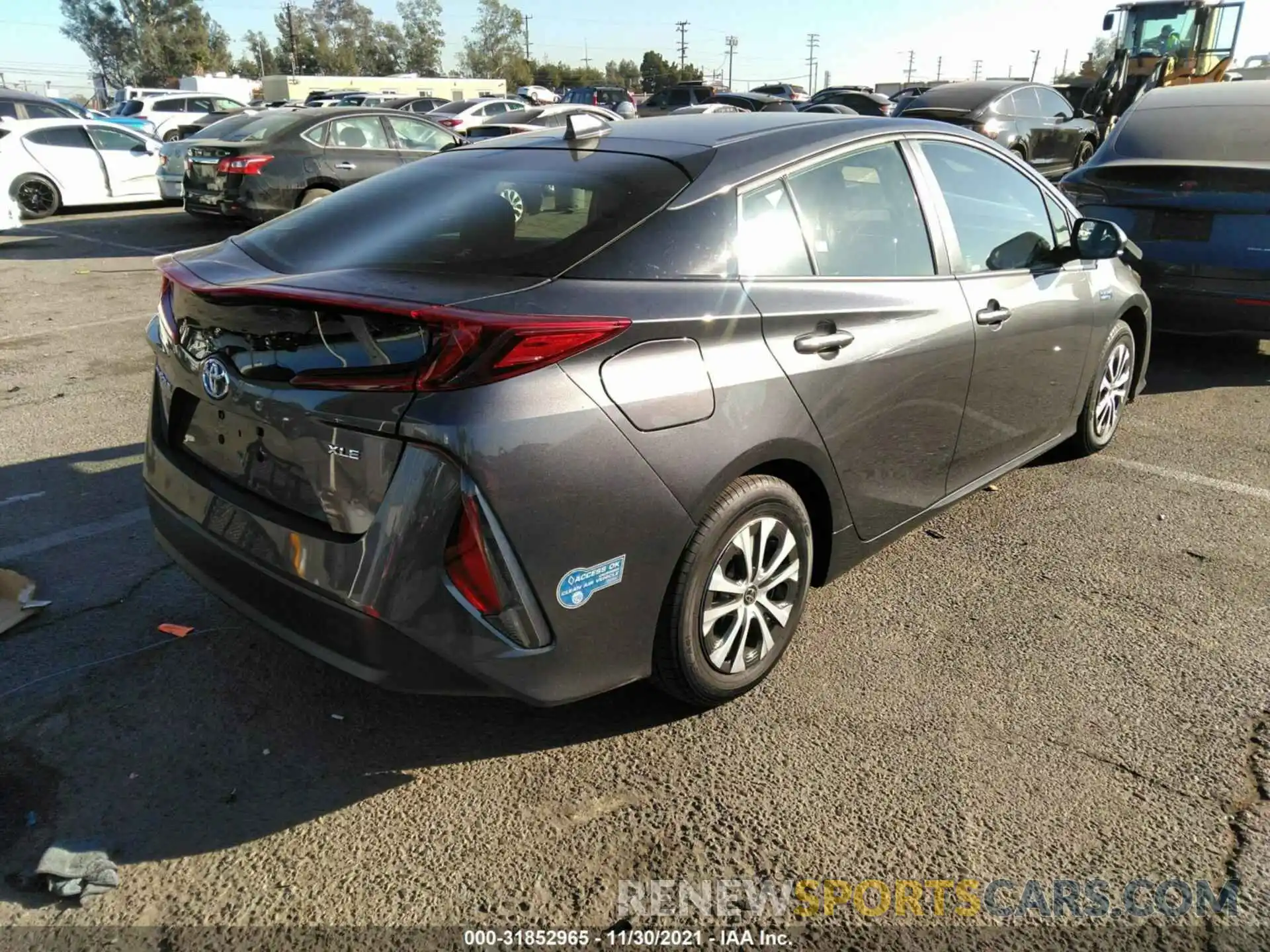 4 Photograph of a damaged car JTDKAMFP1M3176559 TOYOTA PRIUS PRIME 2021