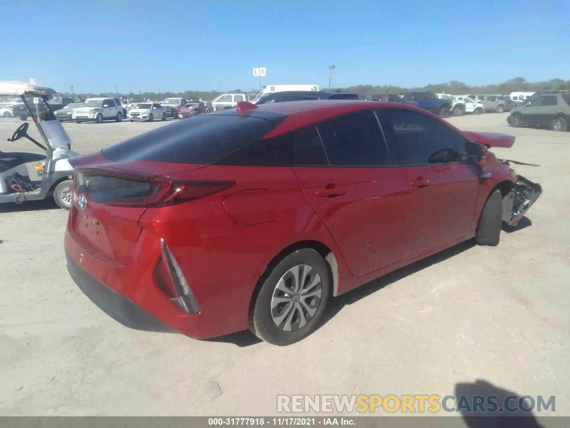 4 Photograph of a damaged car JTDKAMFP1M3180496 TOYOTA PRIUS PRIME 2021