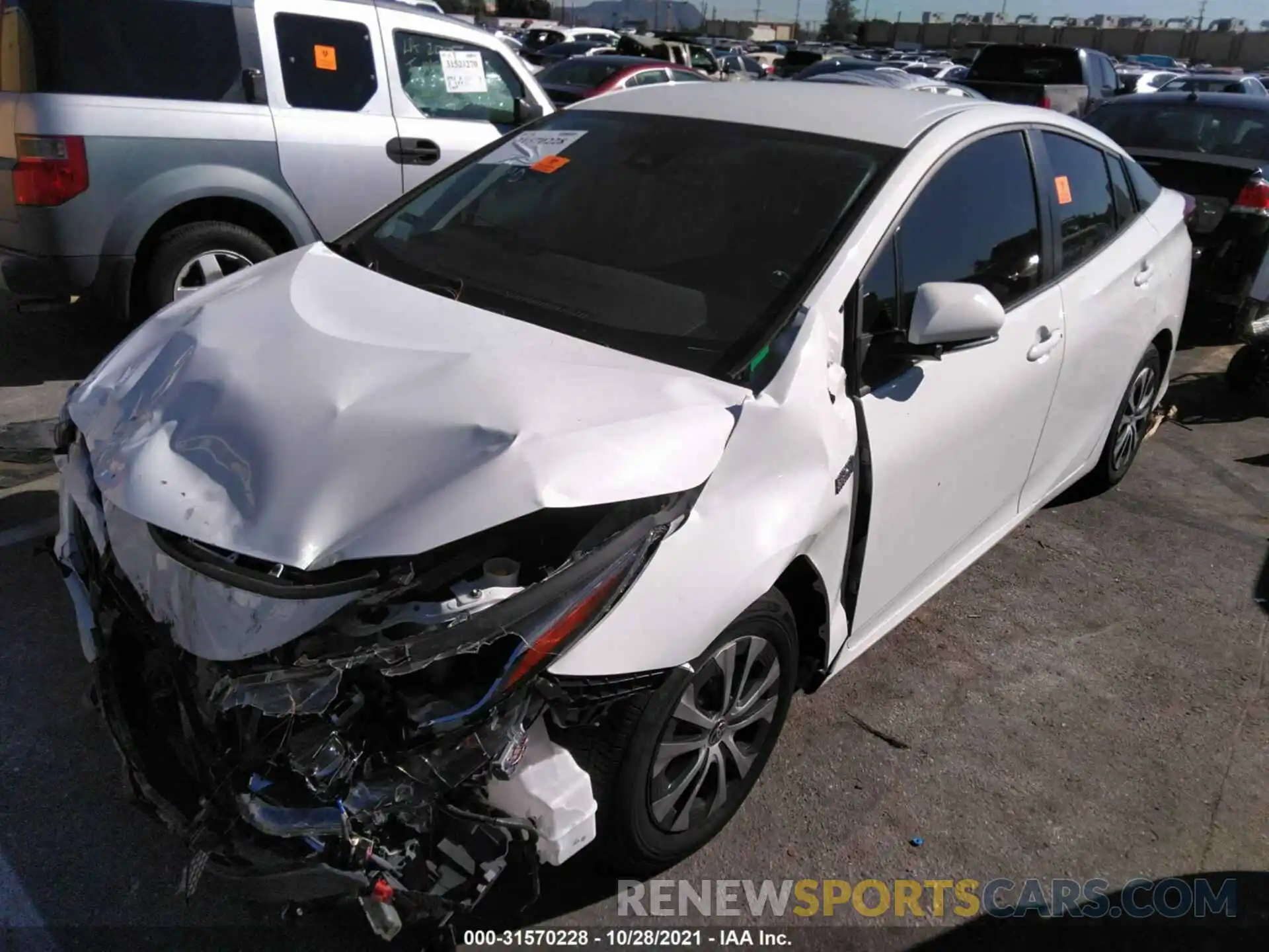 2 Photograph of a damaged car JTDKAMFP1M3185035 TOYOTA PRIUS PRIME 2021