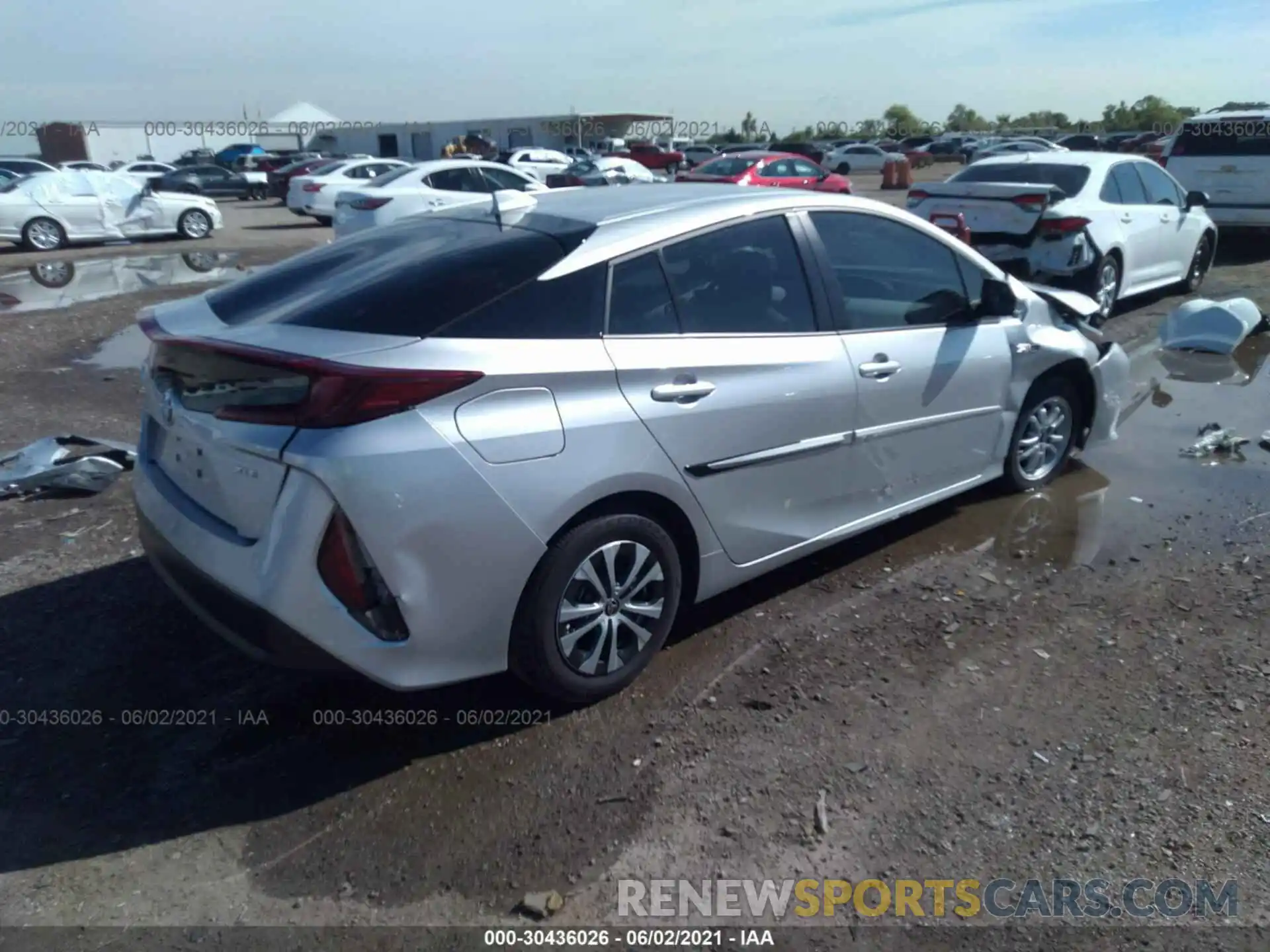 4 Photograph of a damaged car JTDKAMFP3M3166079 TOYOTA PRIUS PRIME 2021