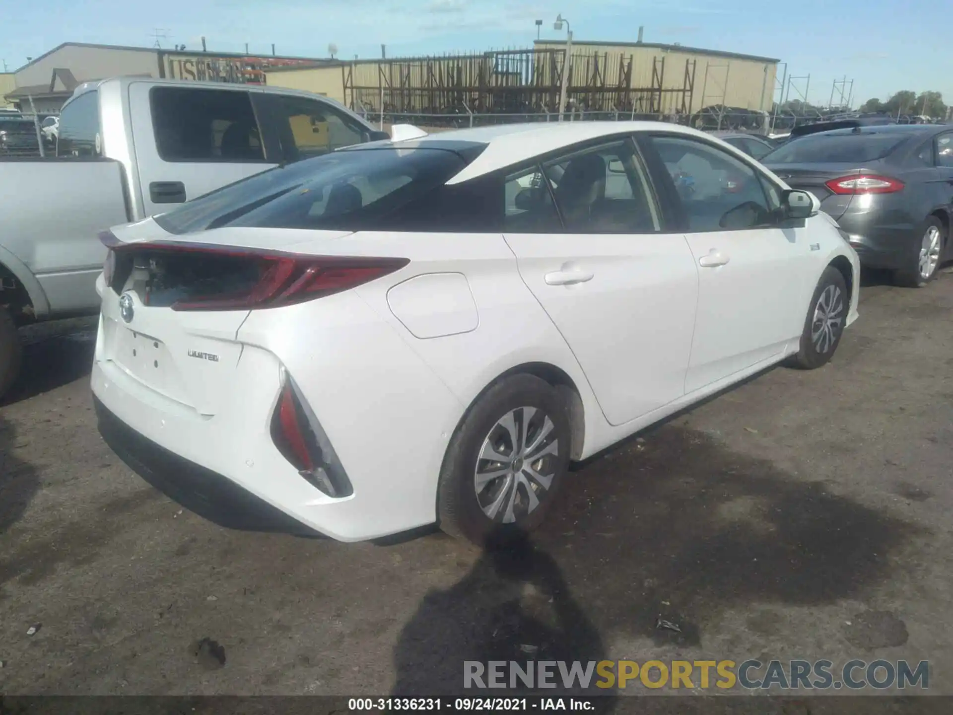 4 Photograph of a damaged car JTDKAMFP3M3169256 TOYOTA PRIUS PRIME 2021