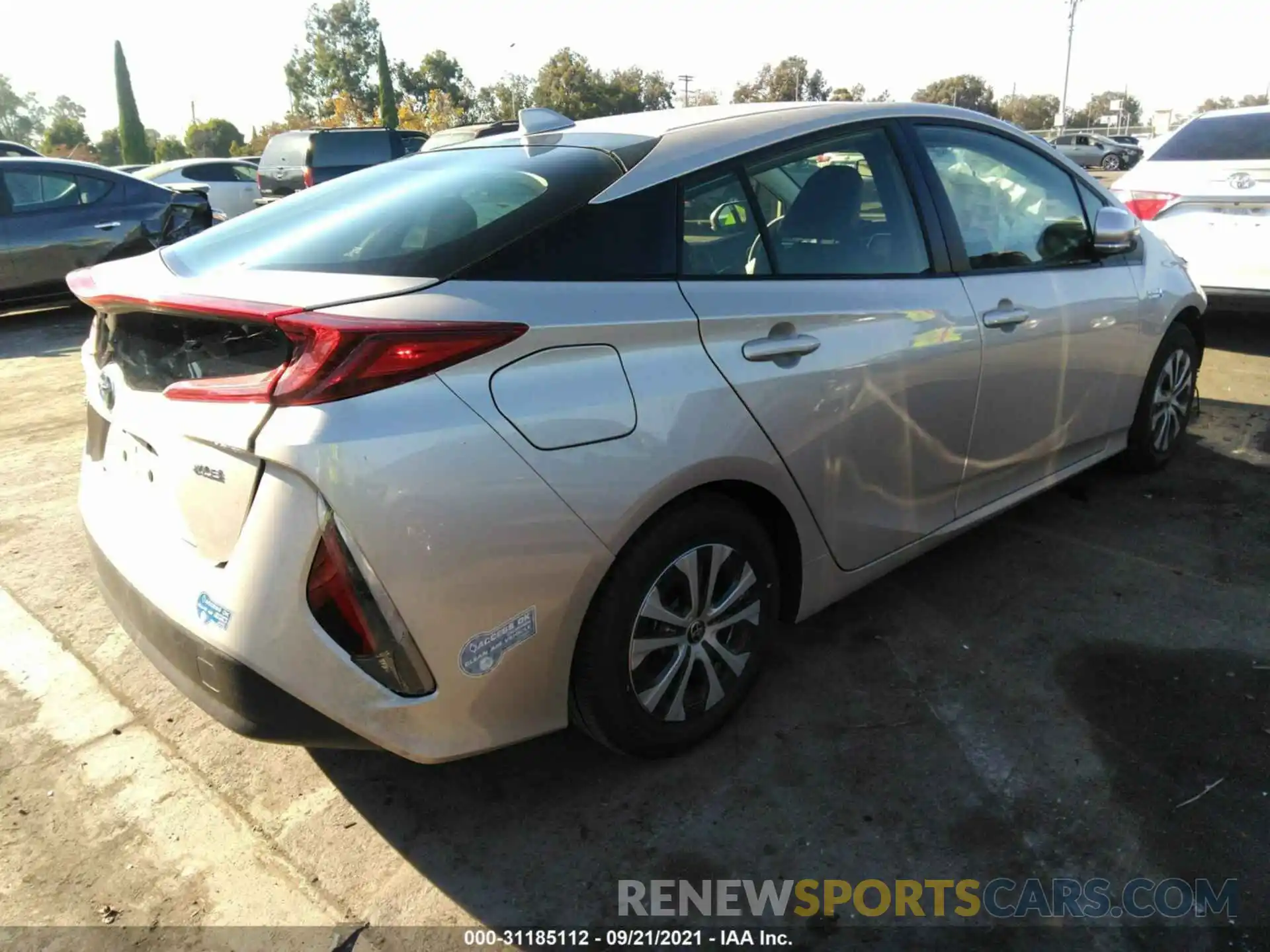 4 Photograph of a damaged car JTDKAMFP3M3174215 TOYOTA PRIUS PRIME 2021