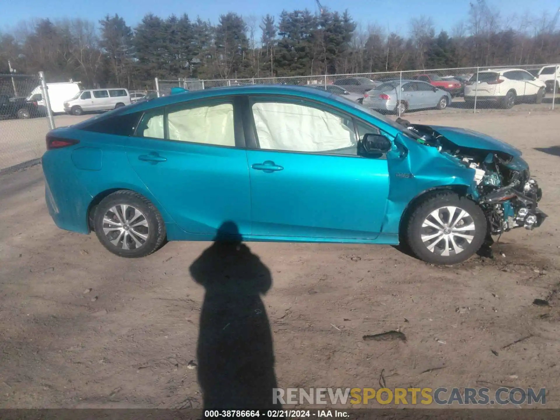 12 Photograph of a damaged car JTDKAMFP3M3181701 TOYOTA PRIUS PRIME 2021