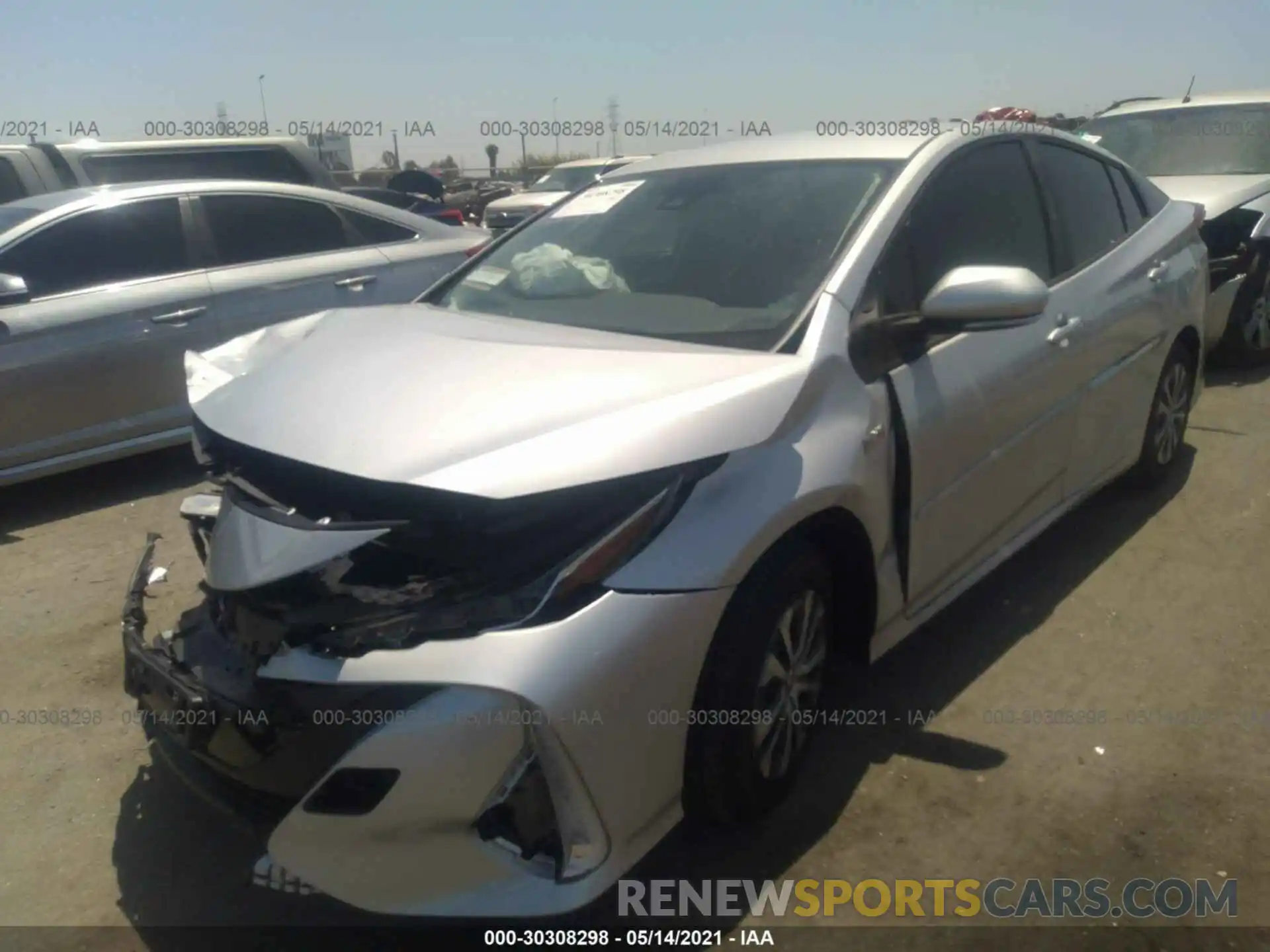 2 Photograph of a damaged car JTDKAMFP3M3185067 TOYOTA PRIUS PRIME 2021